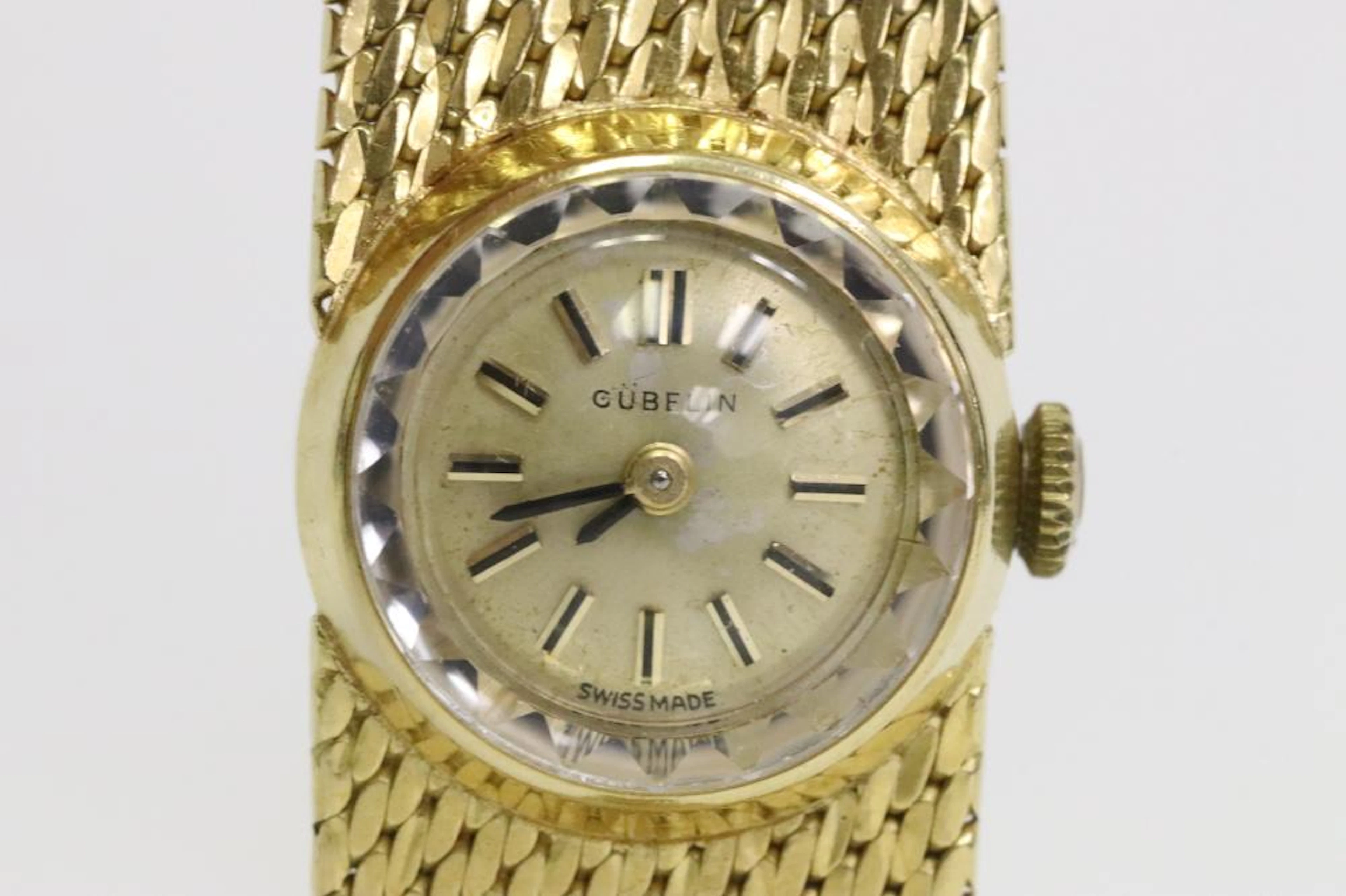 18K Gubelin lady's watch w/ 18K solid gold band
