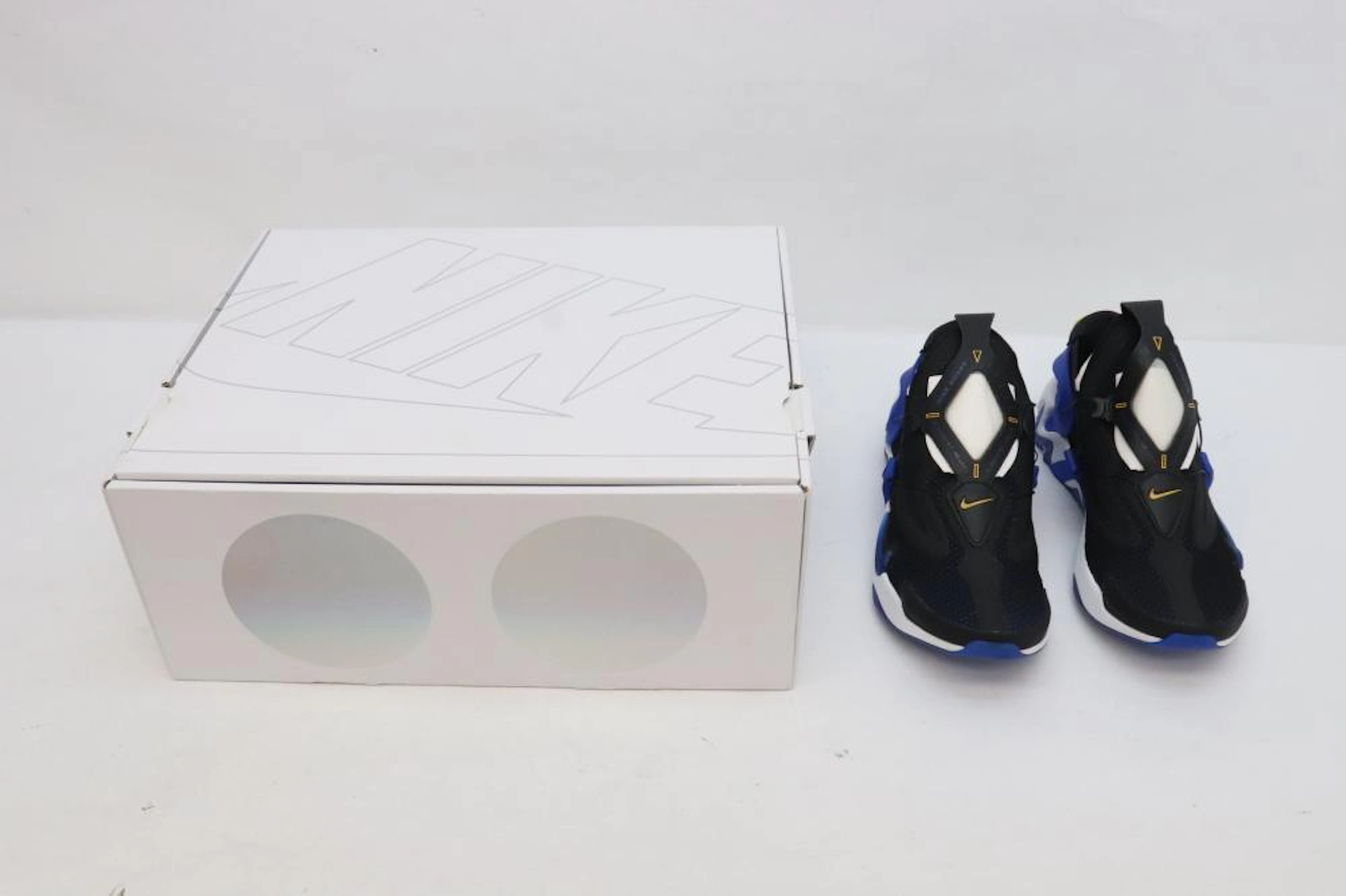 Pair Nike Adapt Huarache air running shoes