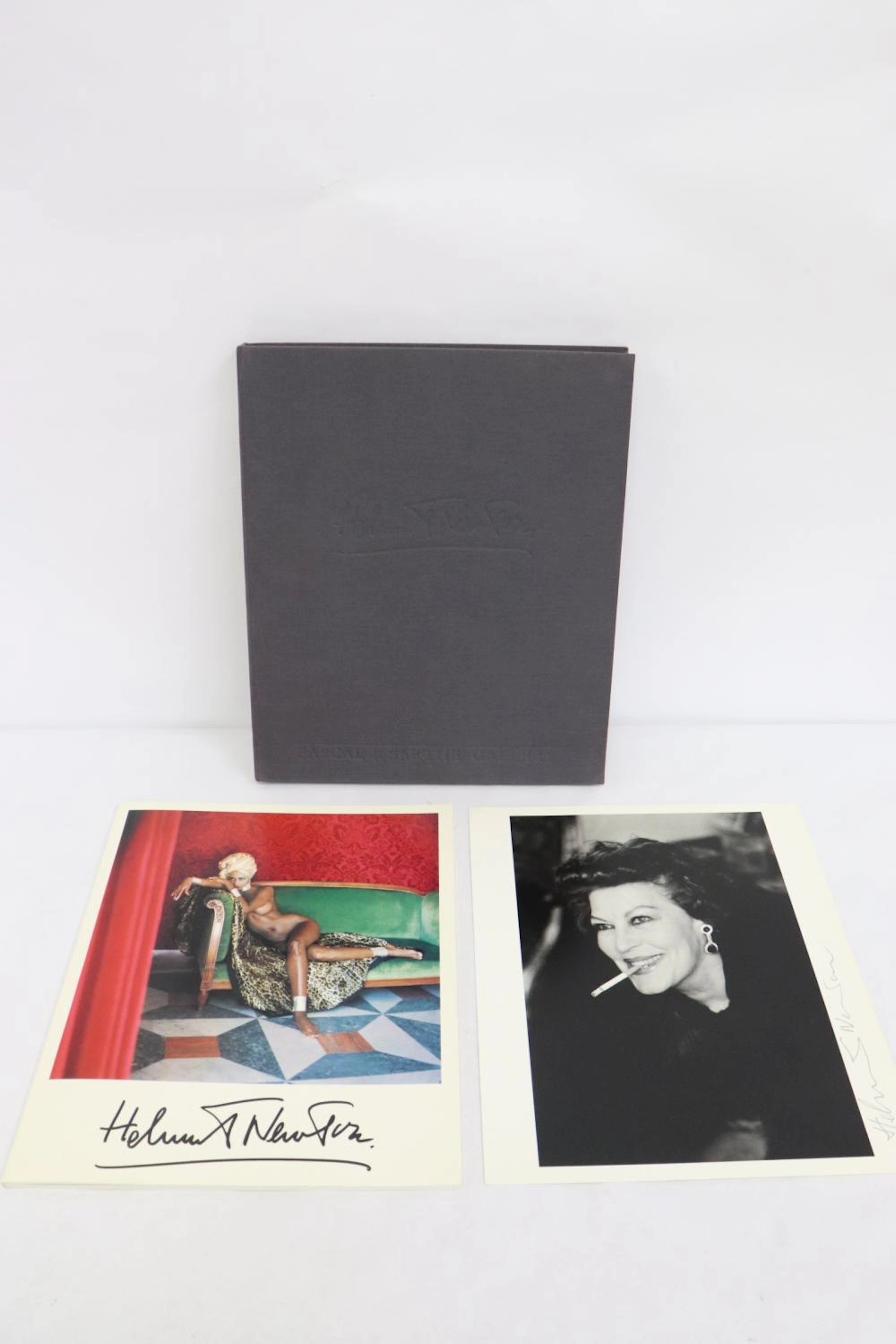 Signed print by Helmut Newton and a book