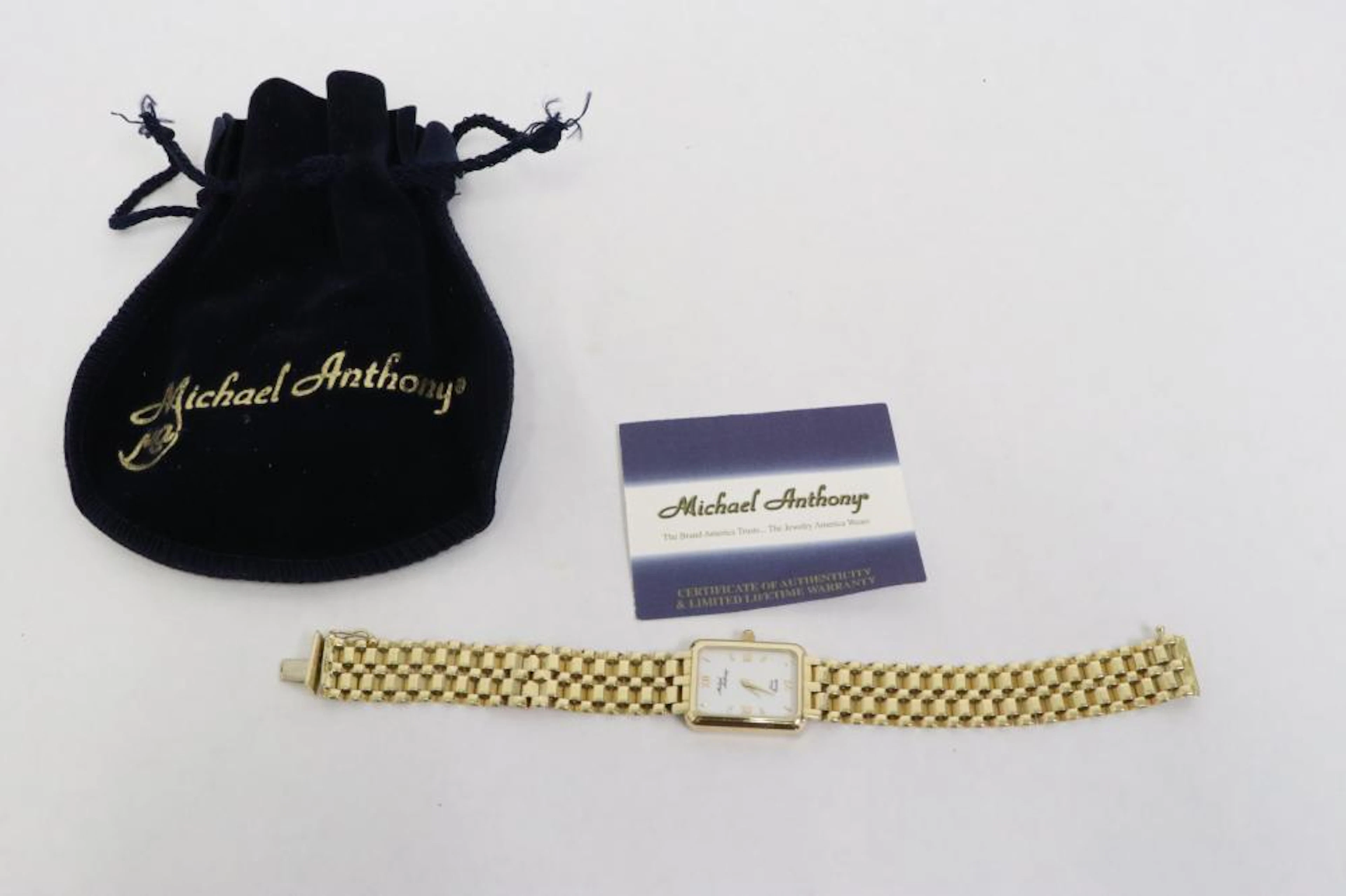 14K watch by Michael Anthony w/ certificate