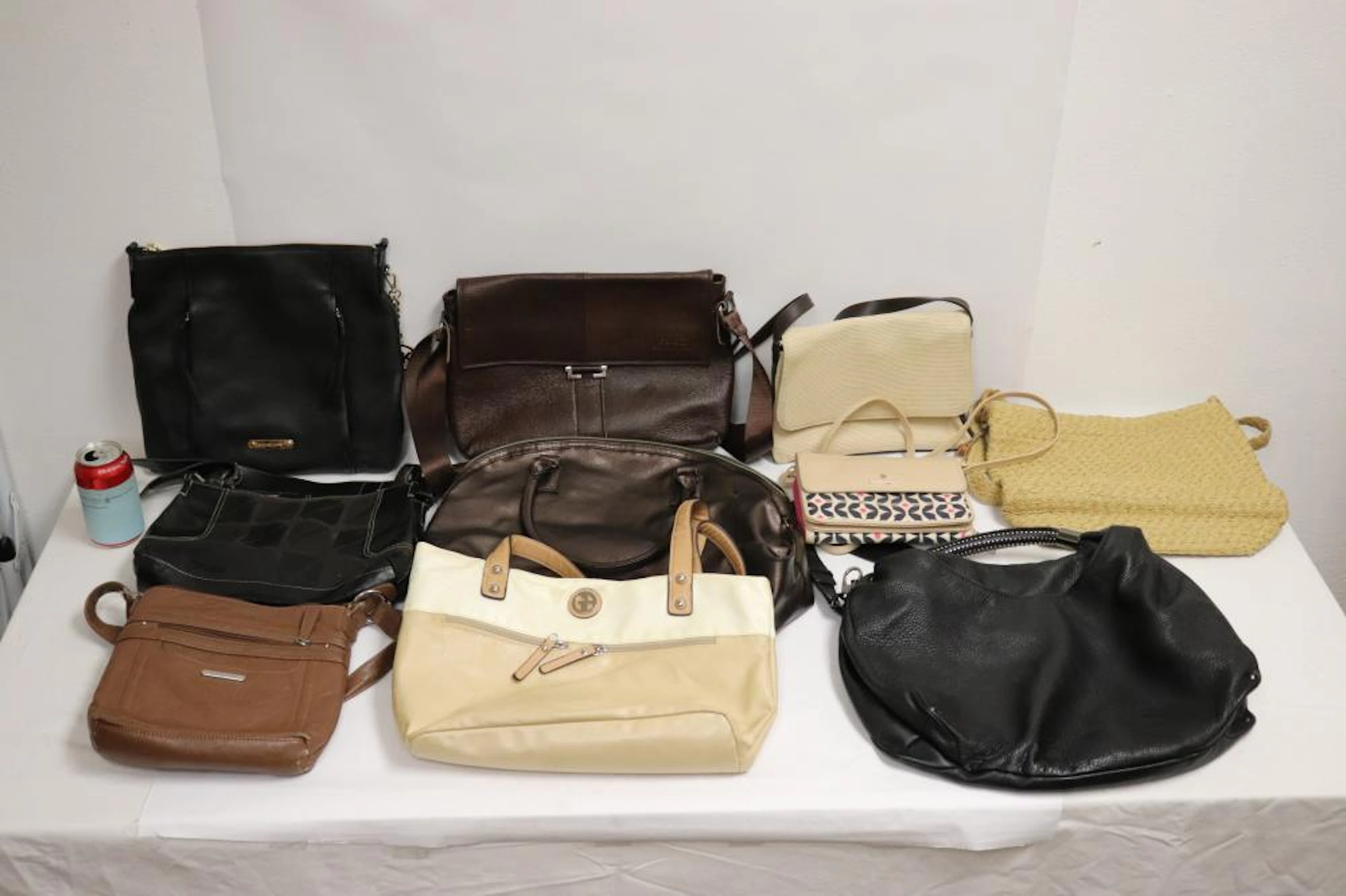 10 lady's leather and canvas handbags