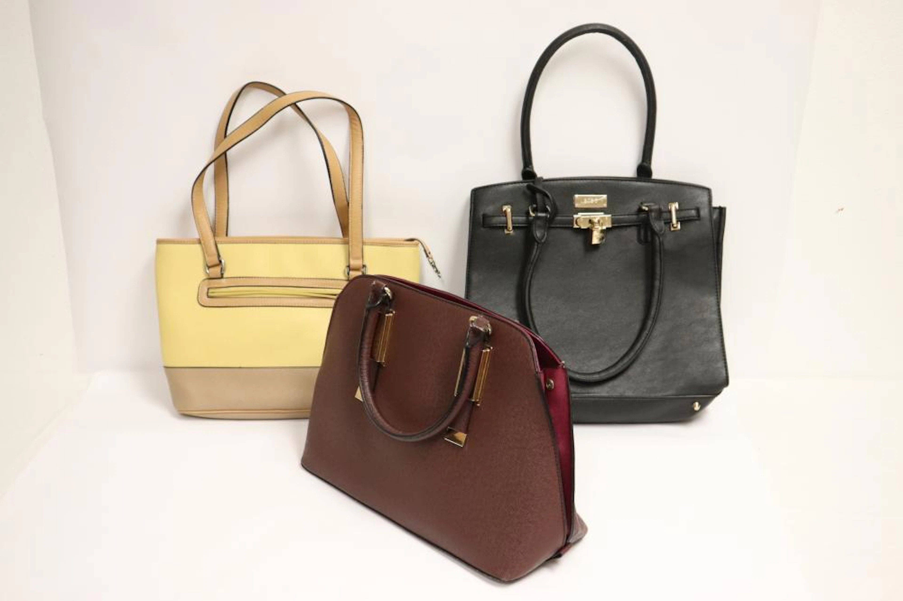 3 leather handbags