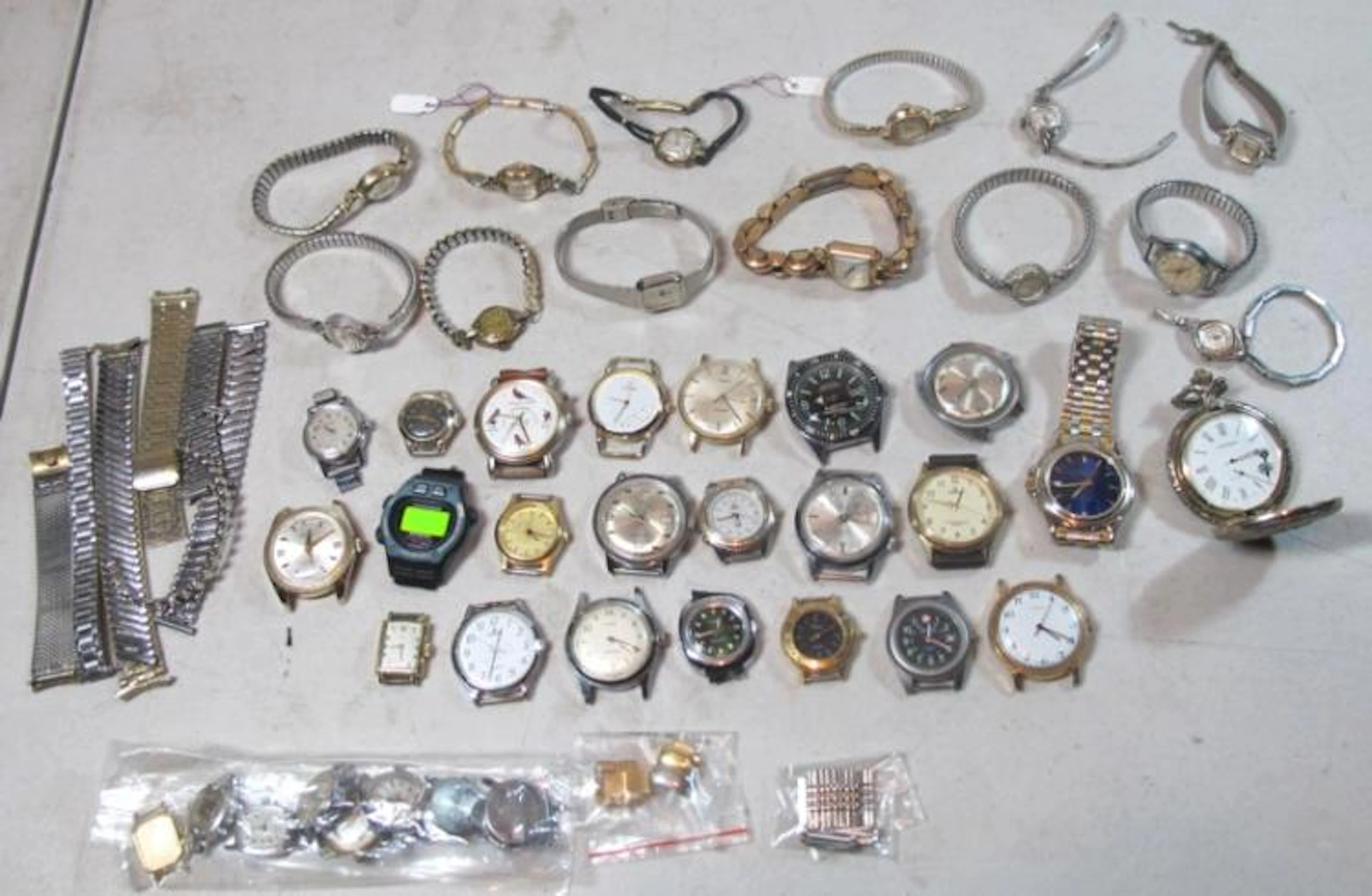 30+ ASSORTED WATCHES FAKE ROLEX TIMEX MILUS LONGINES...