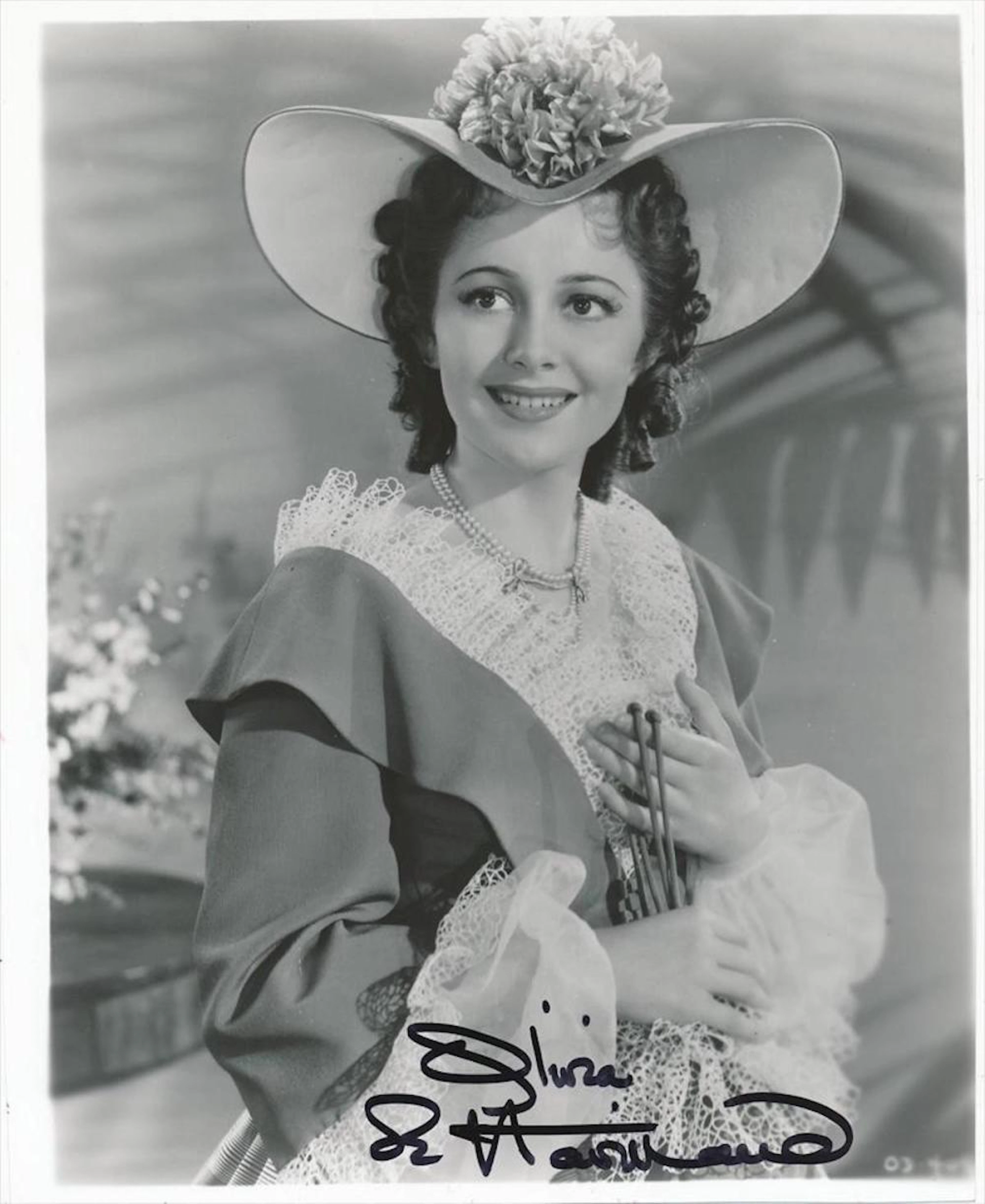 Olivia De Havilland- Stunning Glossy signed 8 x 10 photograph w/COA
