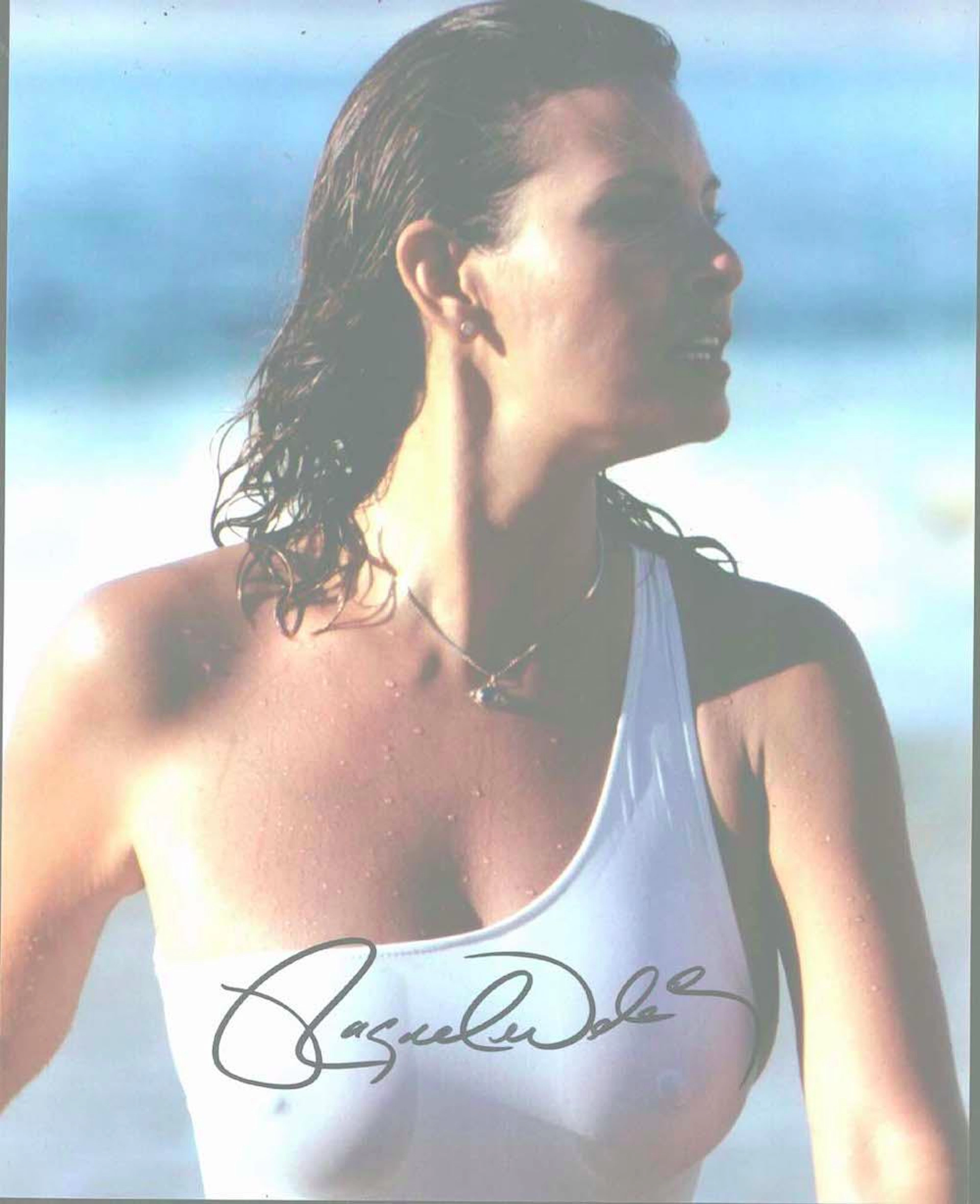 Raquel Welch - 8 x 10 Signed Photograph w/COA