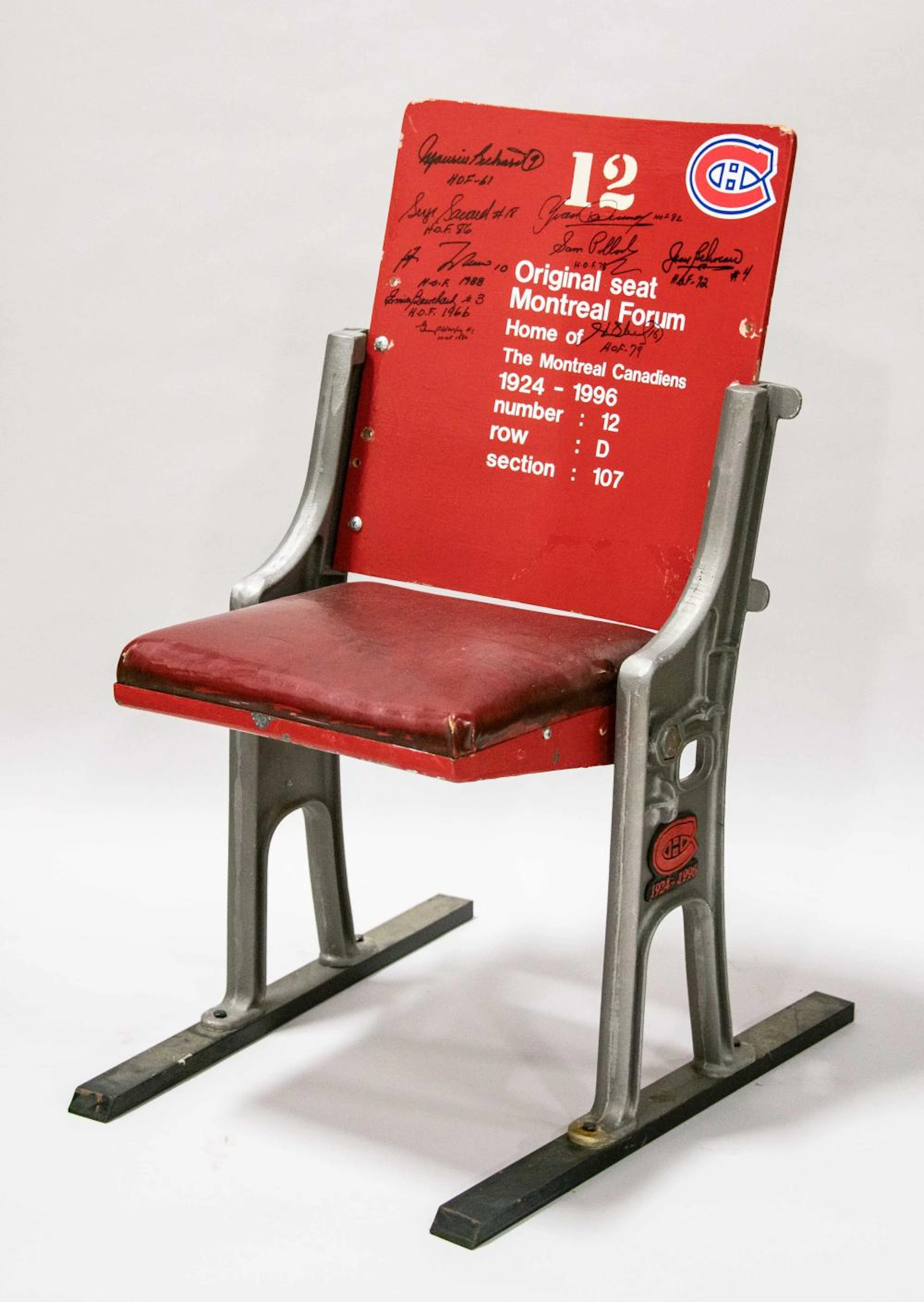 Montreal Forum seat autographed by (9) Hall of Famers.