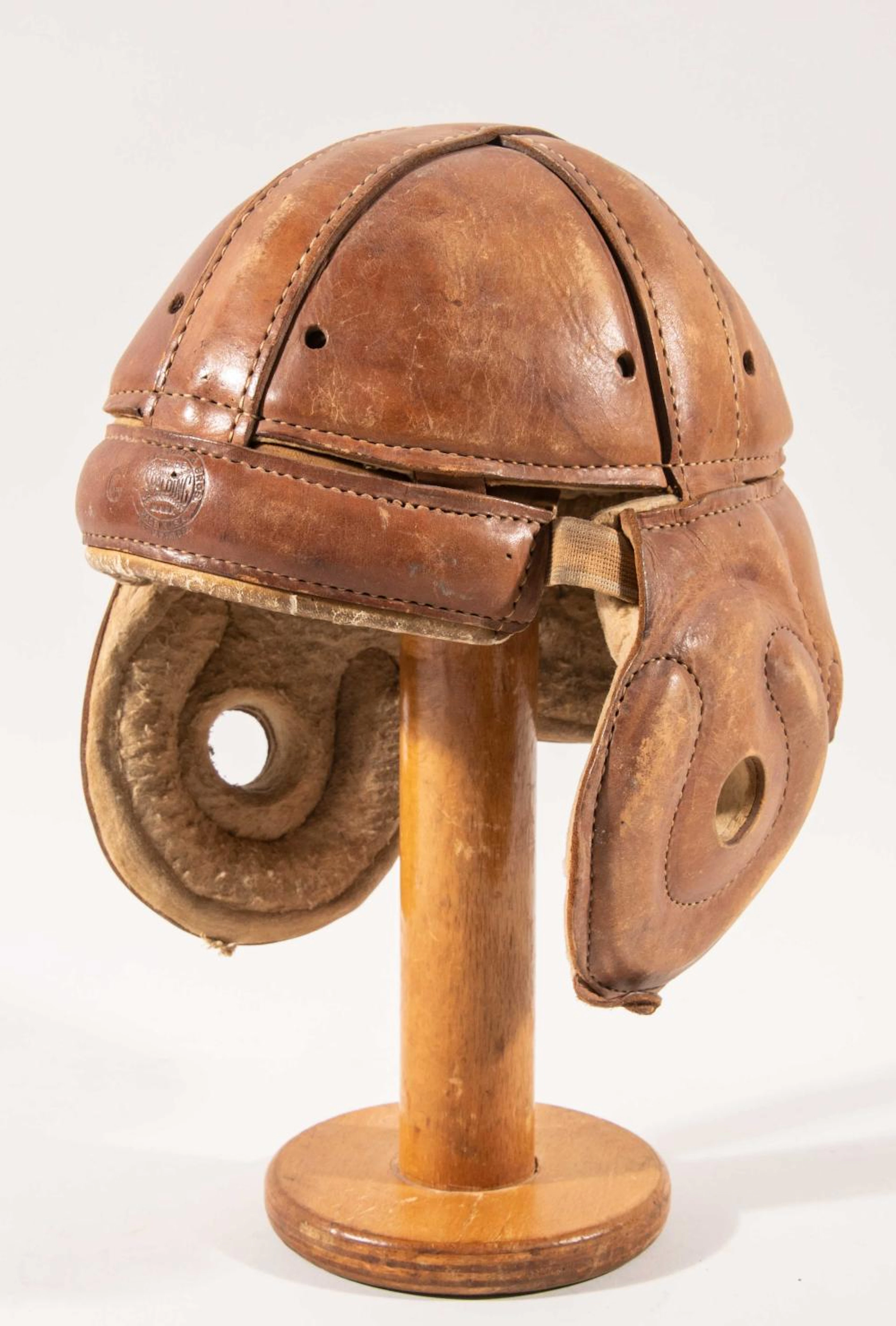 Spalding leather football helmet c.1925-30.