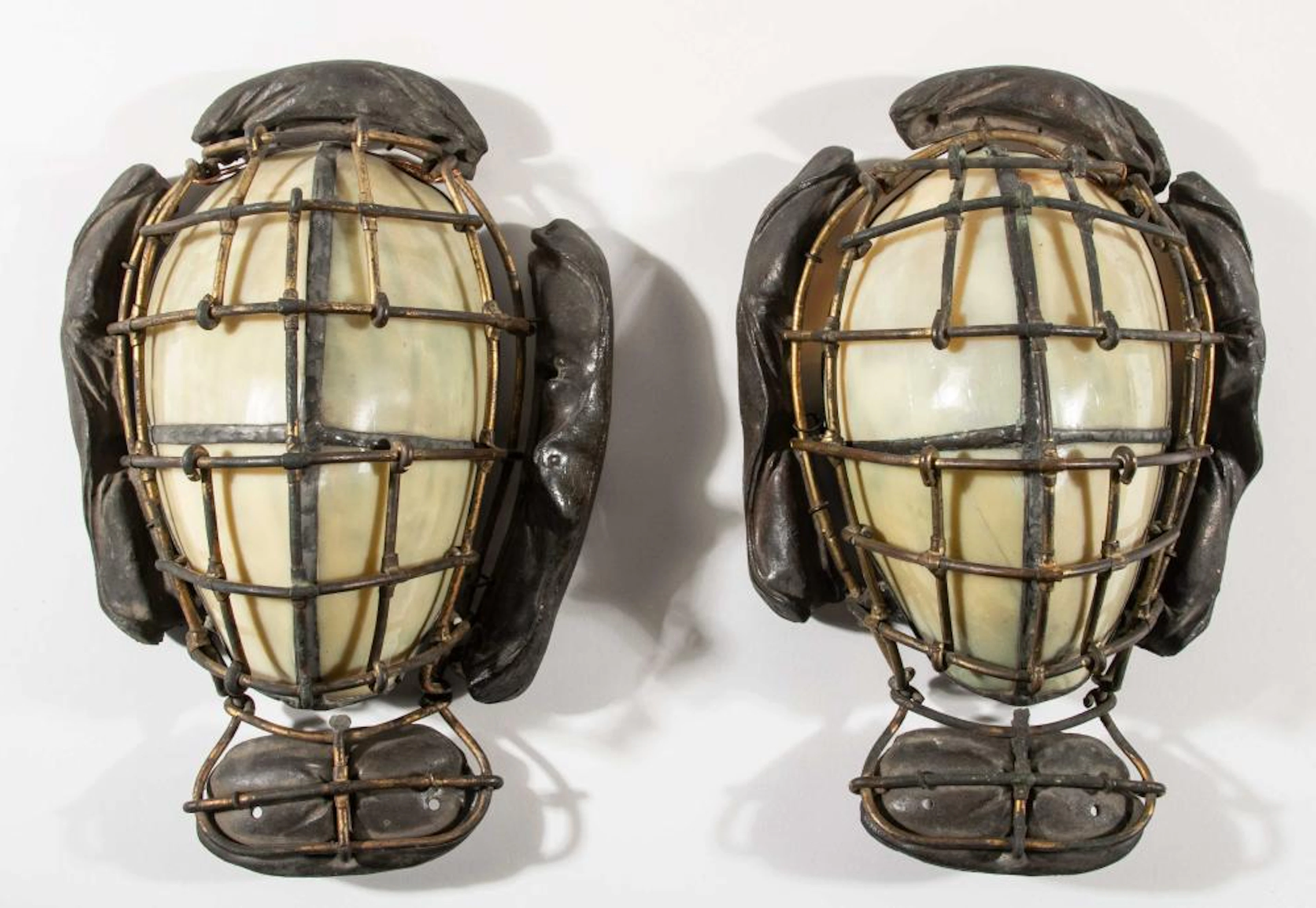 Vintage catchers' mask figural leaded glass and brass wall sconces c.1930s.