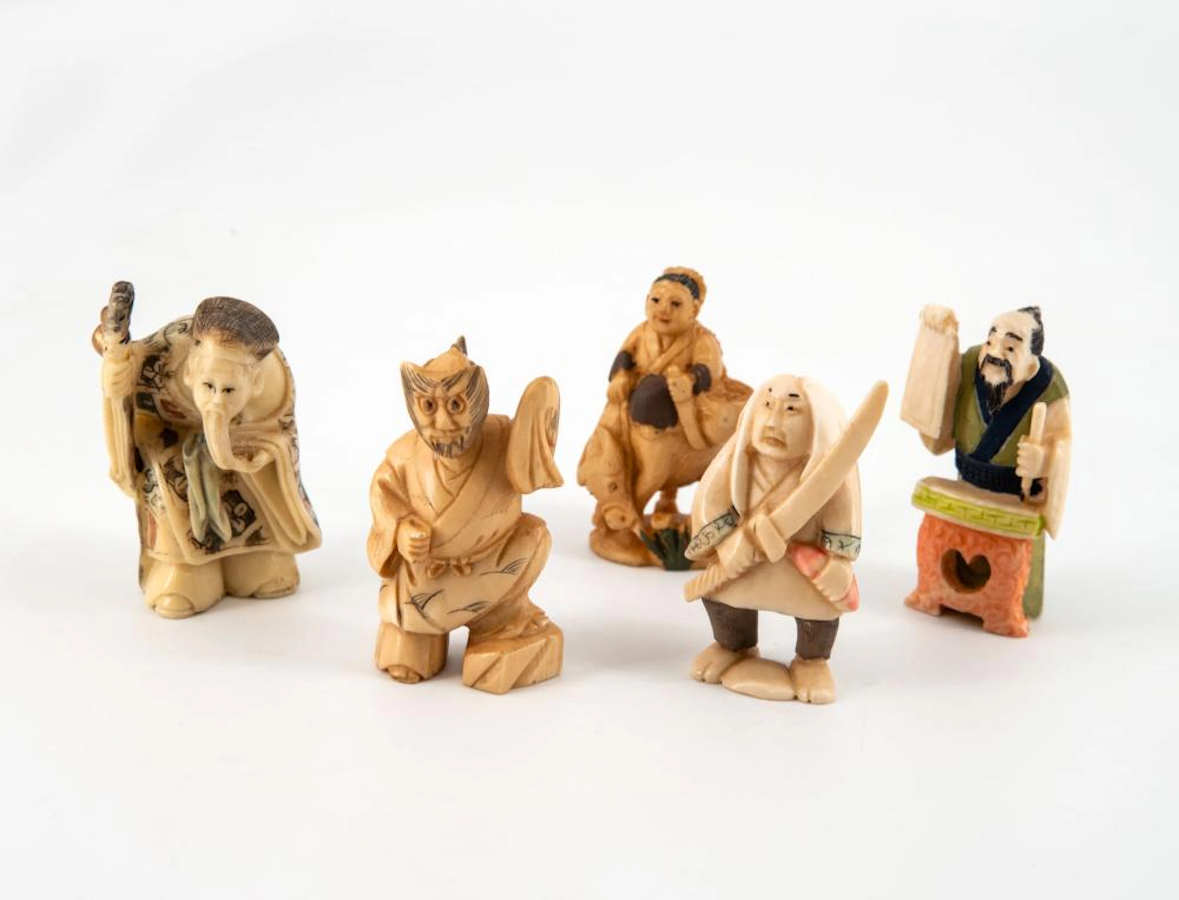 FIVE ANTIQUE POLYCHROME CARVED KATABORI NETSUKE