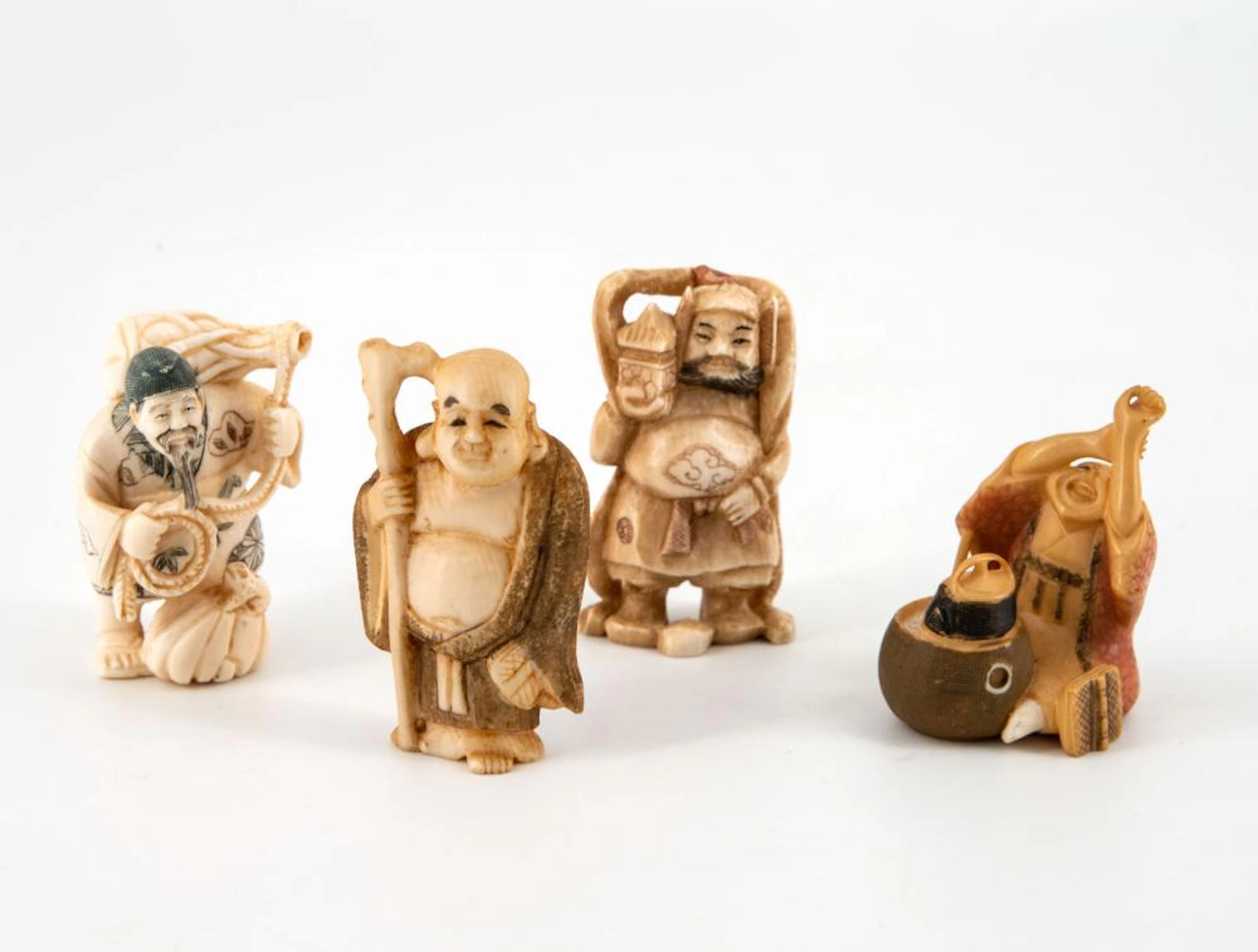 FOUR ANTIQUE CARVED KATABORI NETSUKE, JAPA