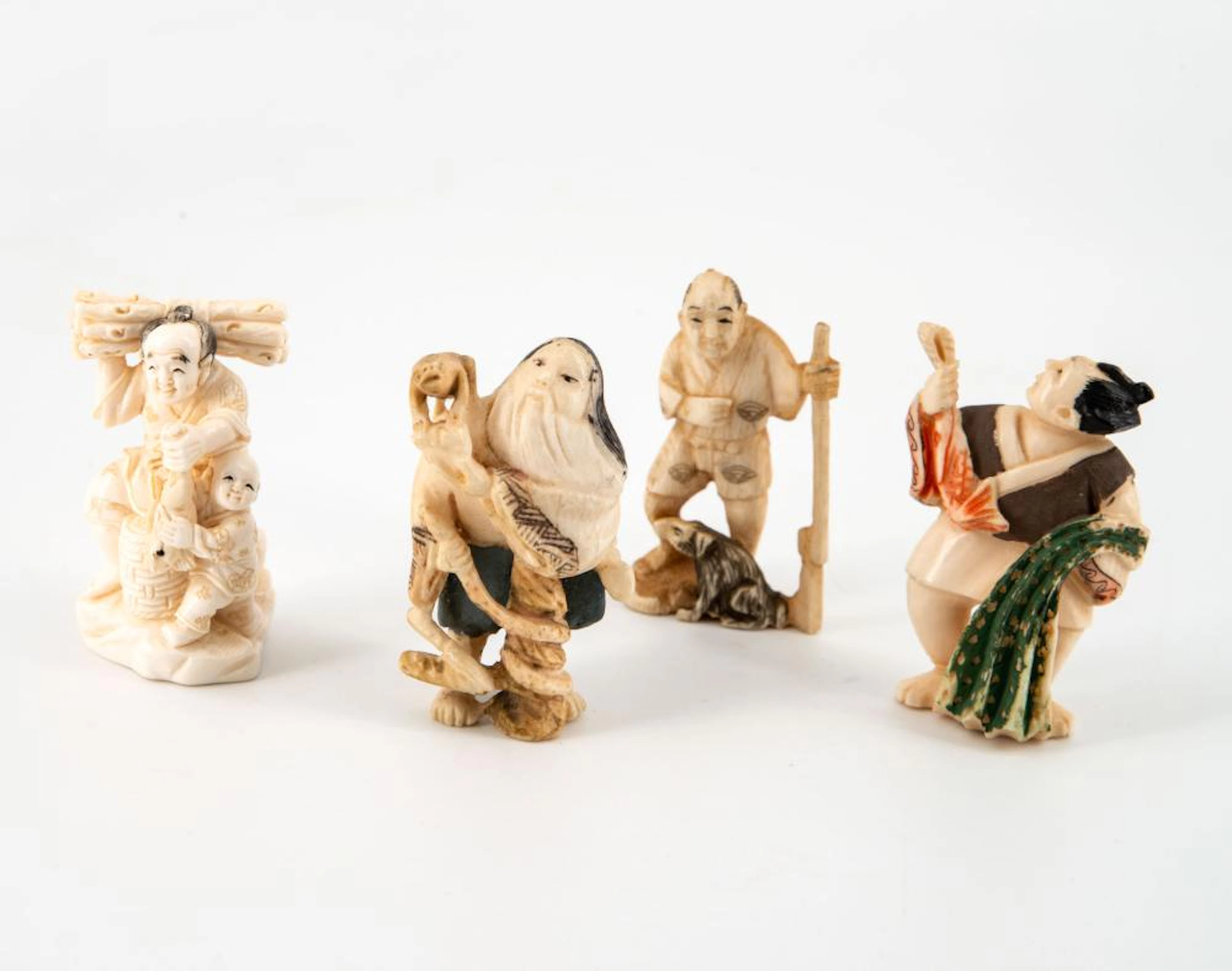 FOUR CARVED POLYCHROME KATABORI NETSUKE, JAPA