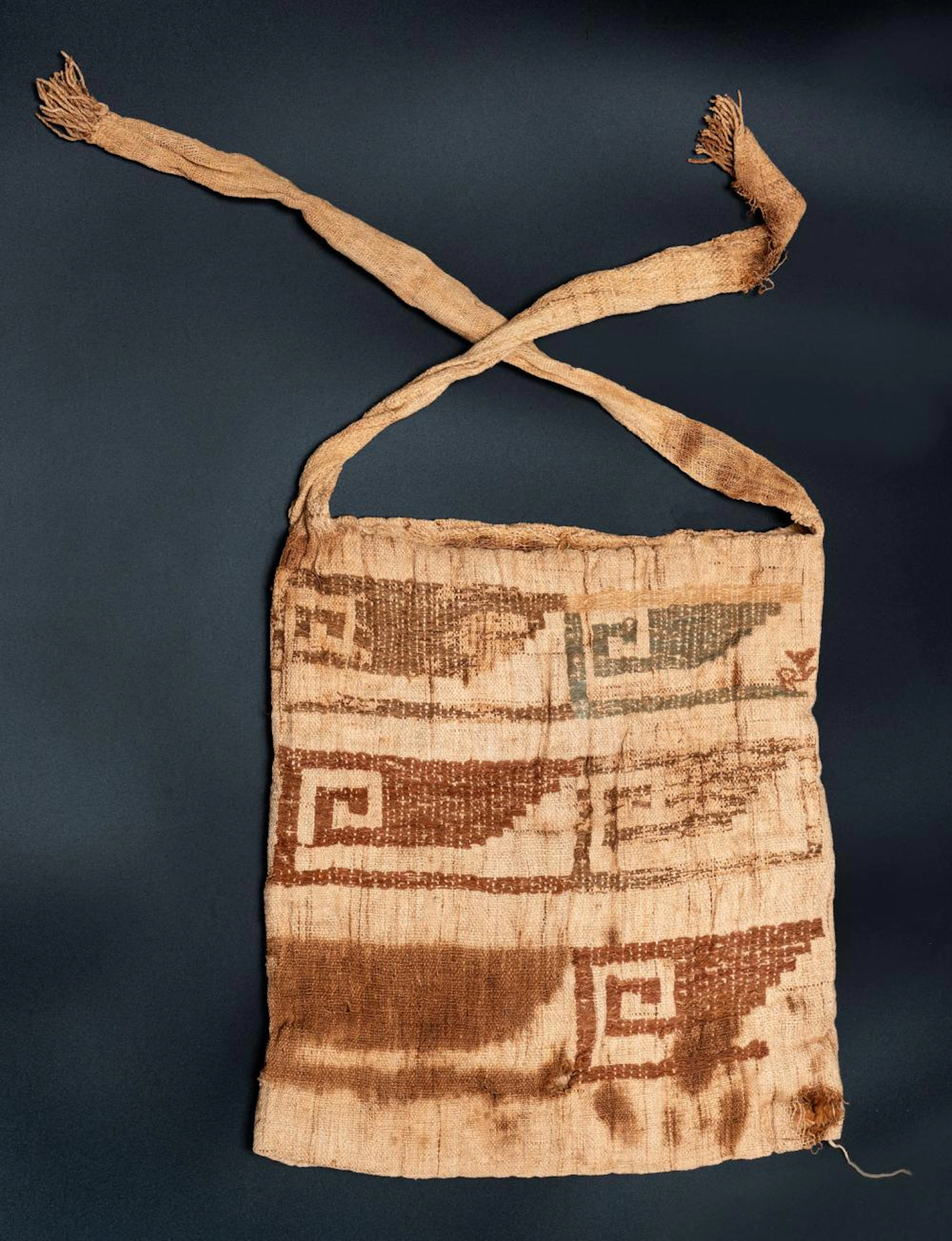 A Padded Hat with Stepped-Fret Decoration