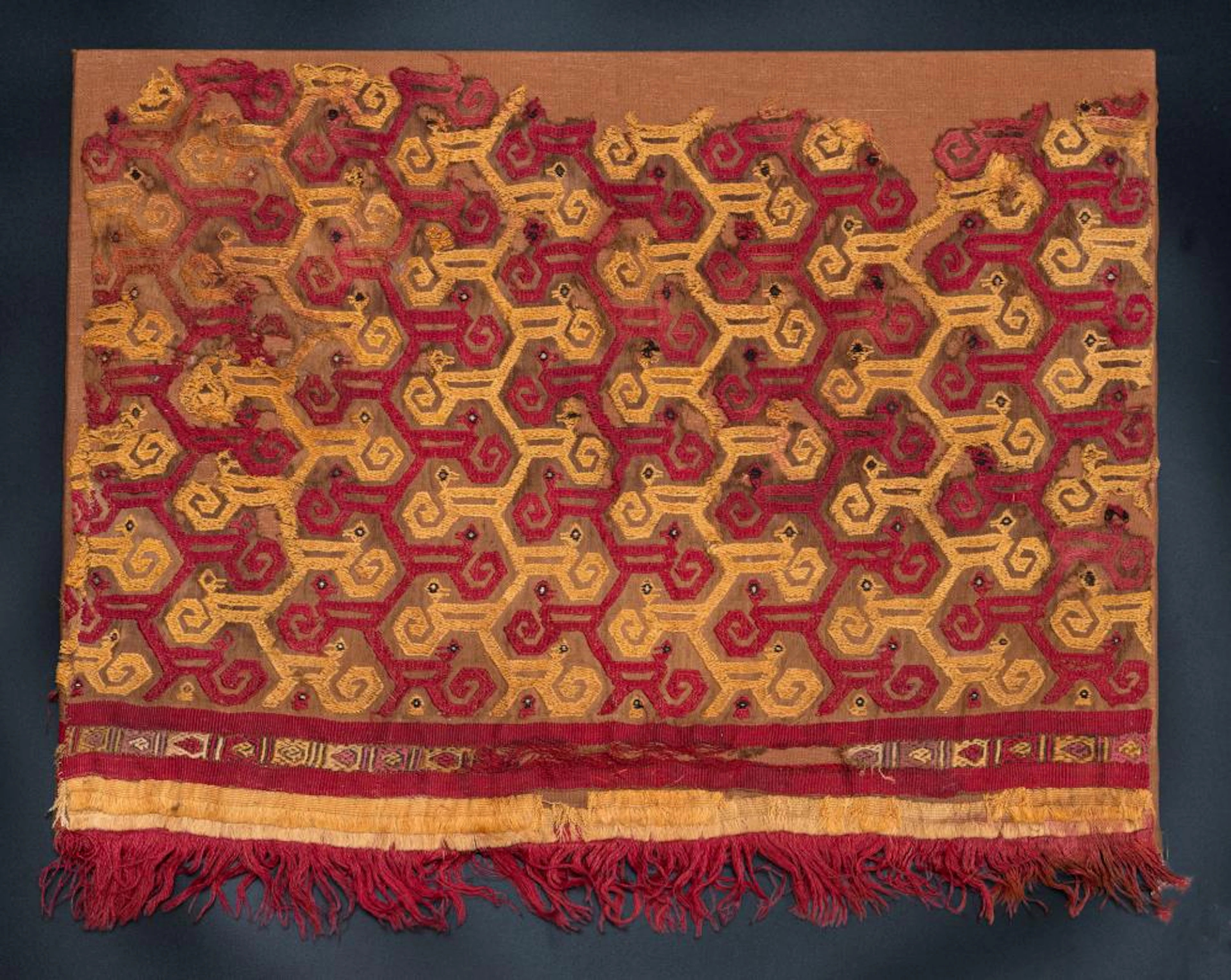 Part of a Textile Decorated with Monkeys with Birds Heads