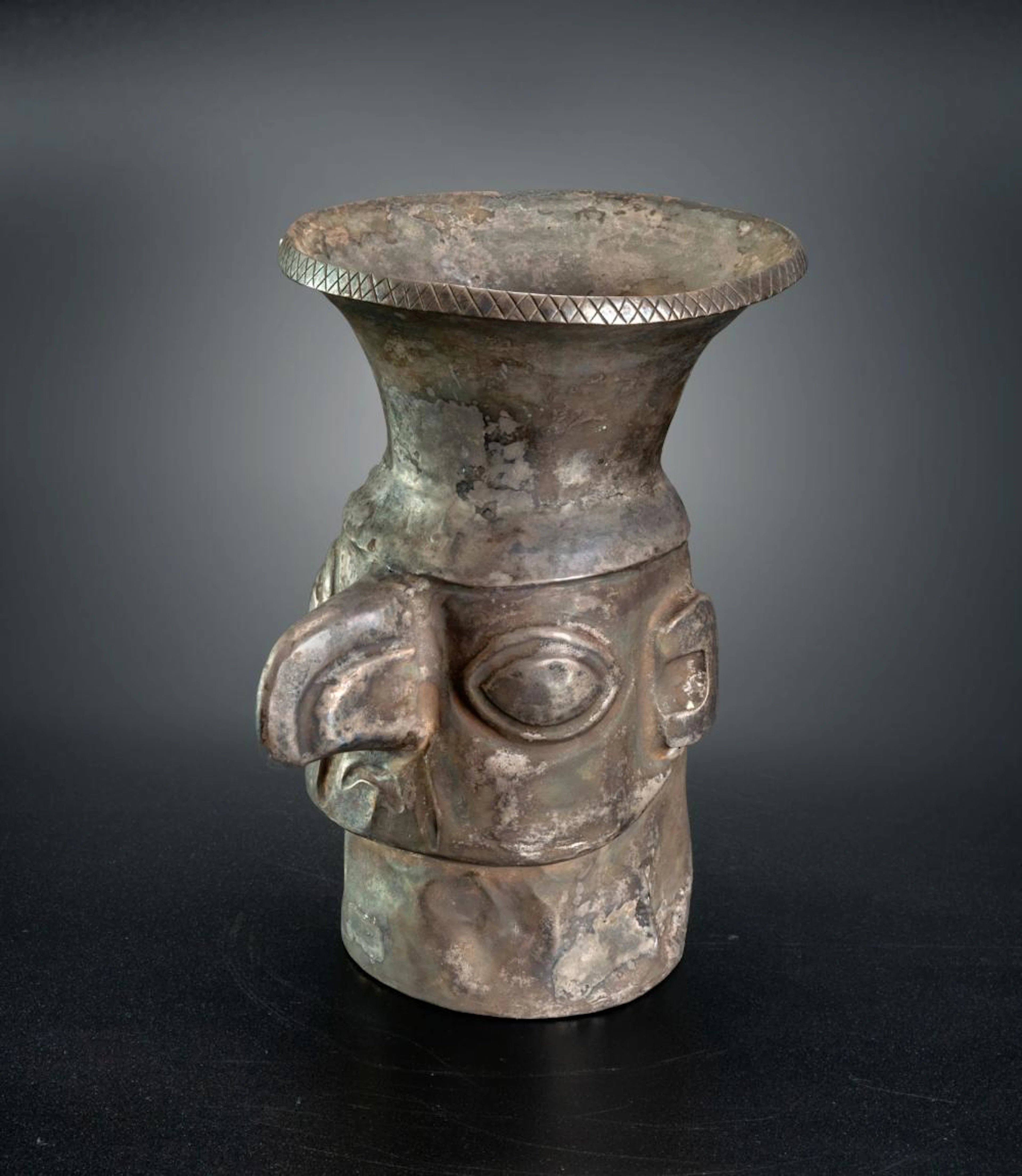 A Silver Keros with an Anthropomorphic Relief, Chimu, Peru, 1200-1460 CE