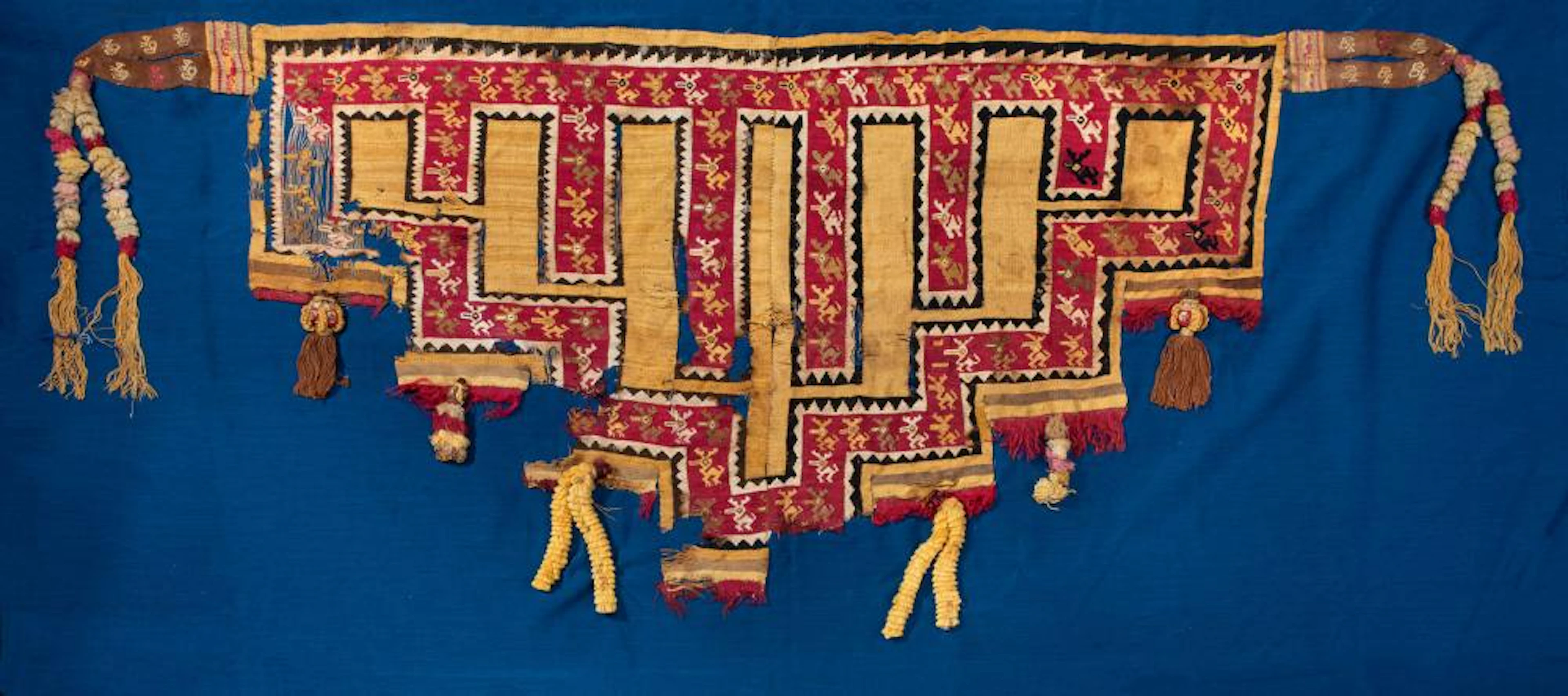 A Stepped Triangular Loincloth with Deer Figures