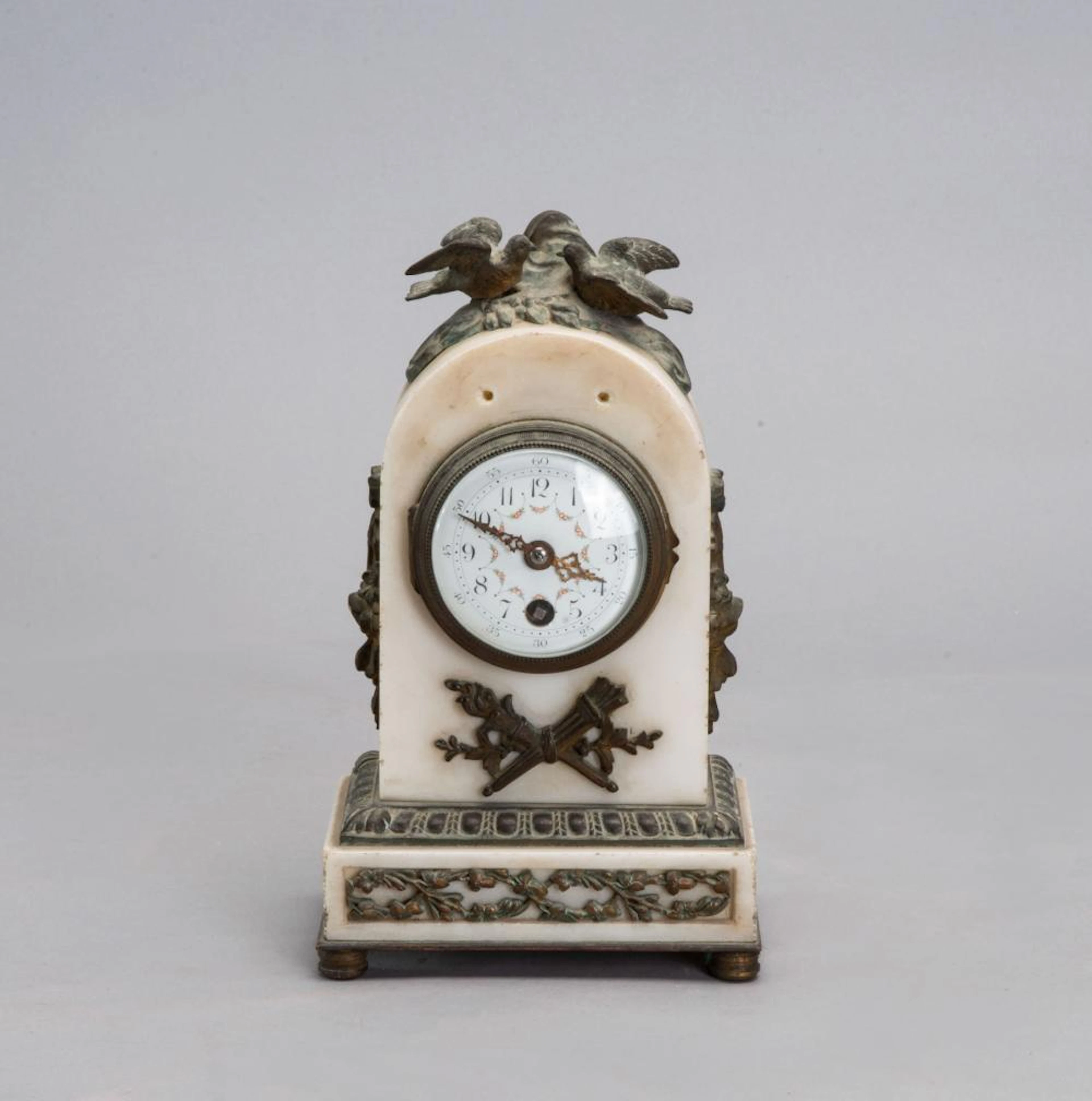 A White Metal and Marble Mantel Clock, France, Late 19th Century