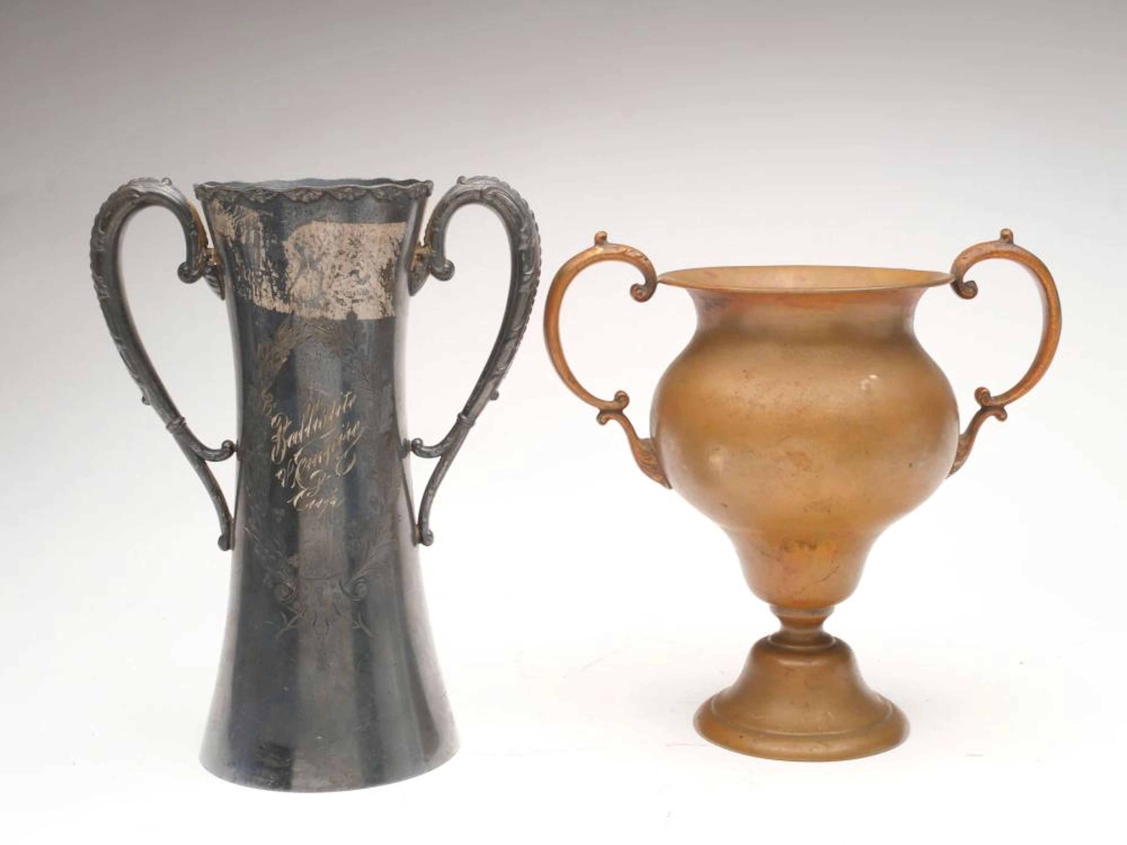 Two competitive shooting trophies.
