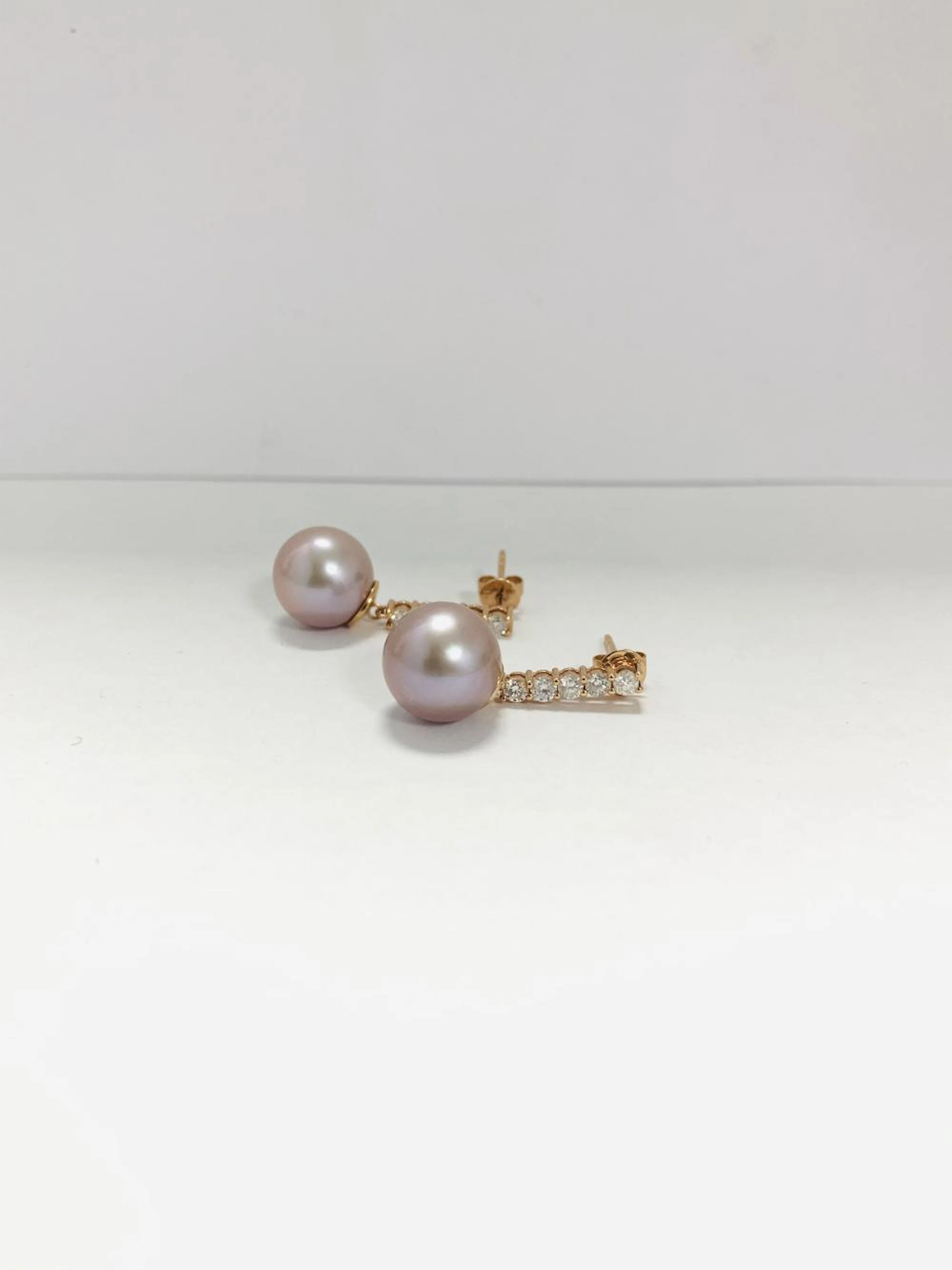 ONE (1) ''14 K'' ROSE GOLD PAIR OF EARRINGS