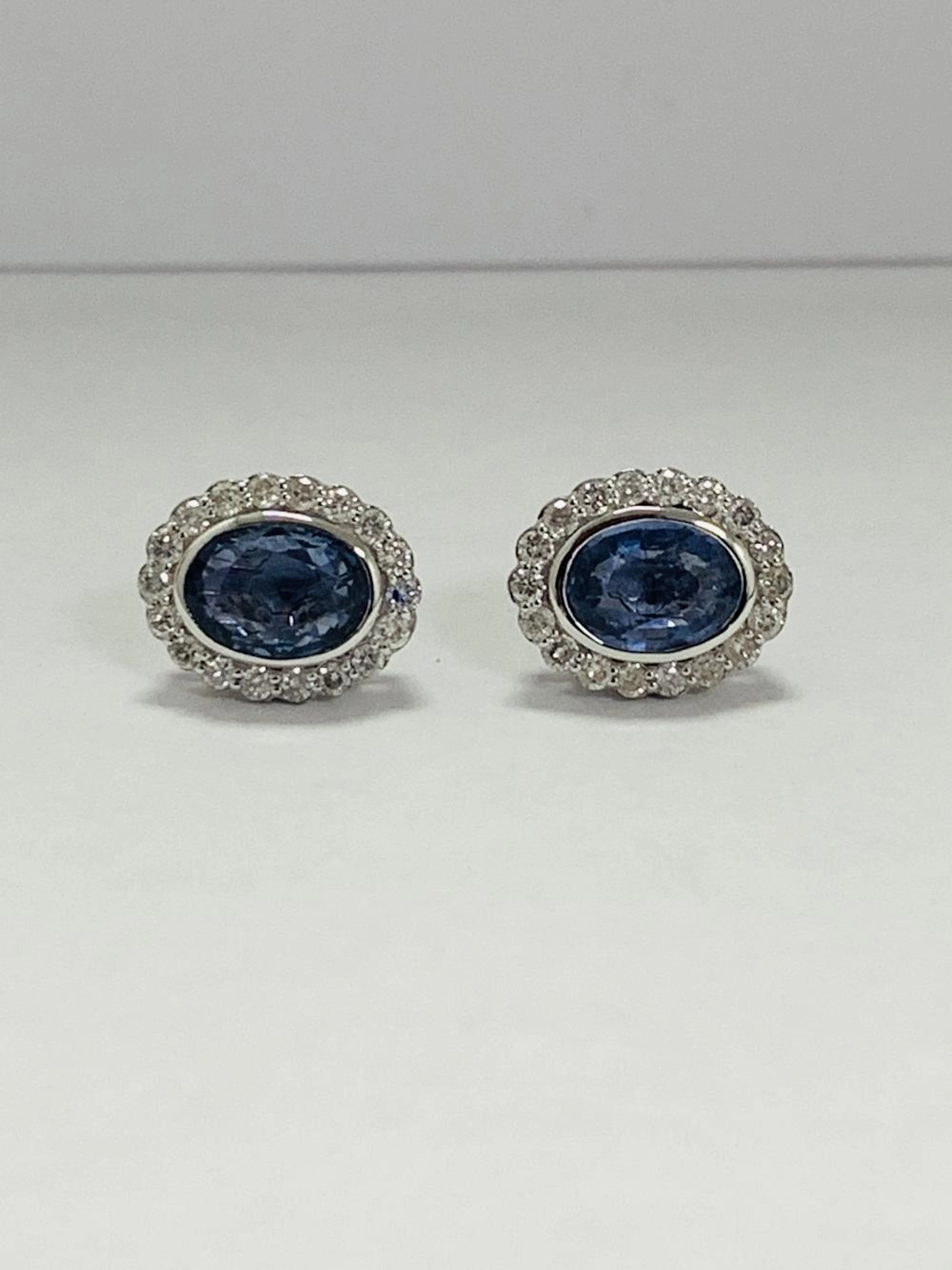 ONE (1) ''14 K'' WHITE GOLD earrings
