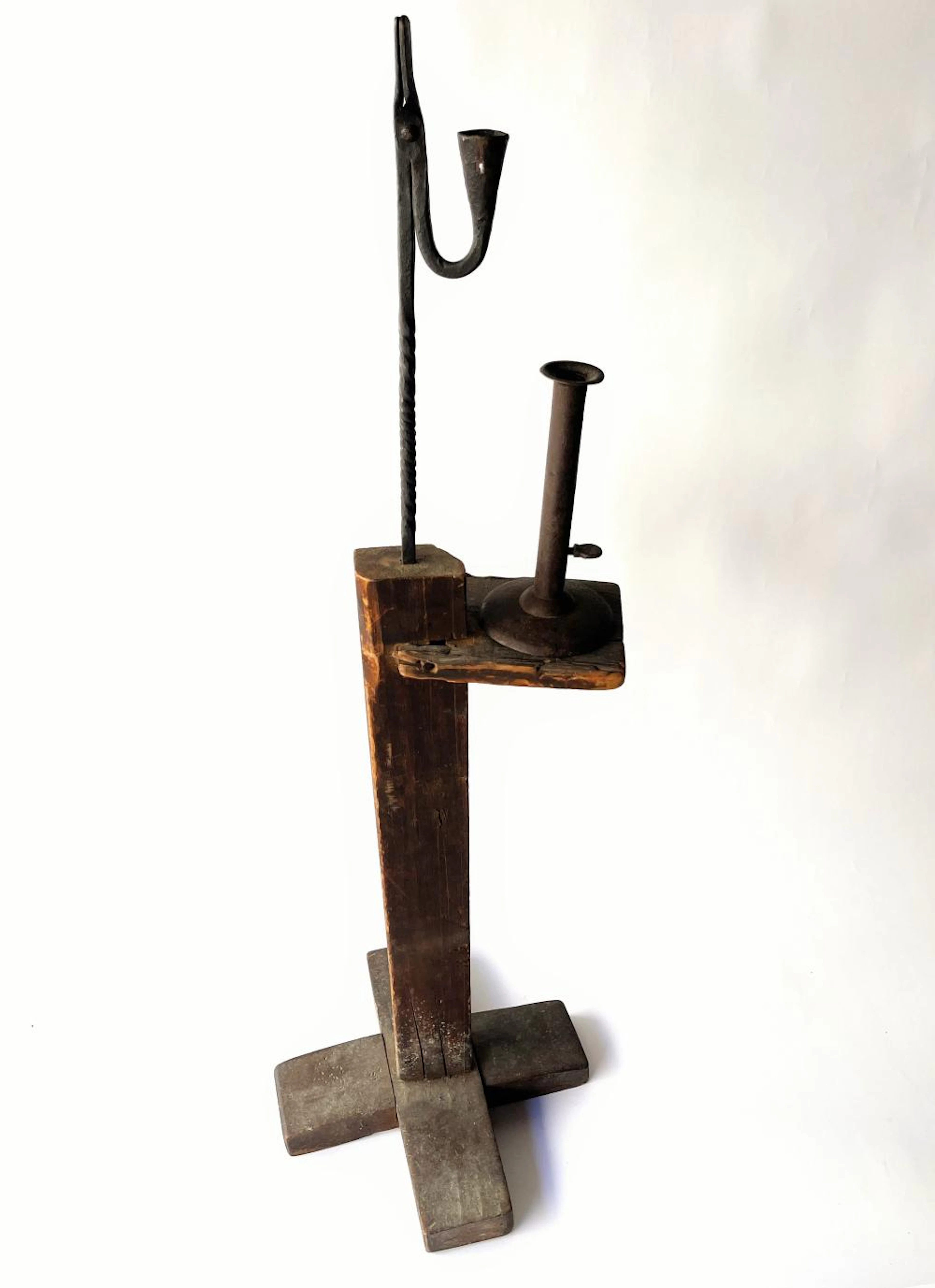 EARLY AND RARE CROSS STRETCHER LIGHTING STAND