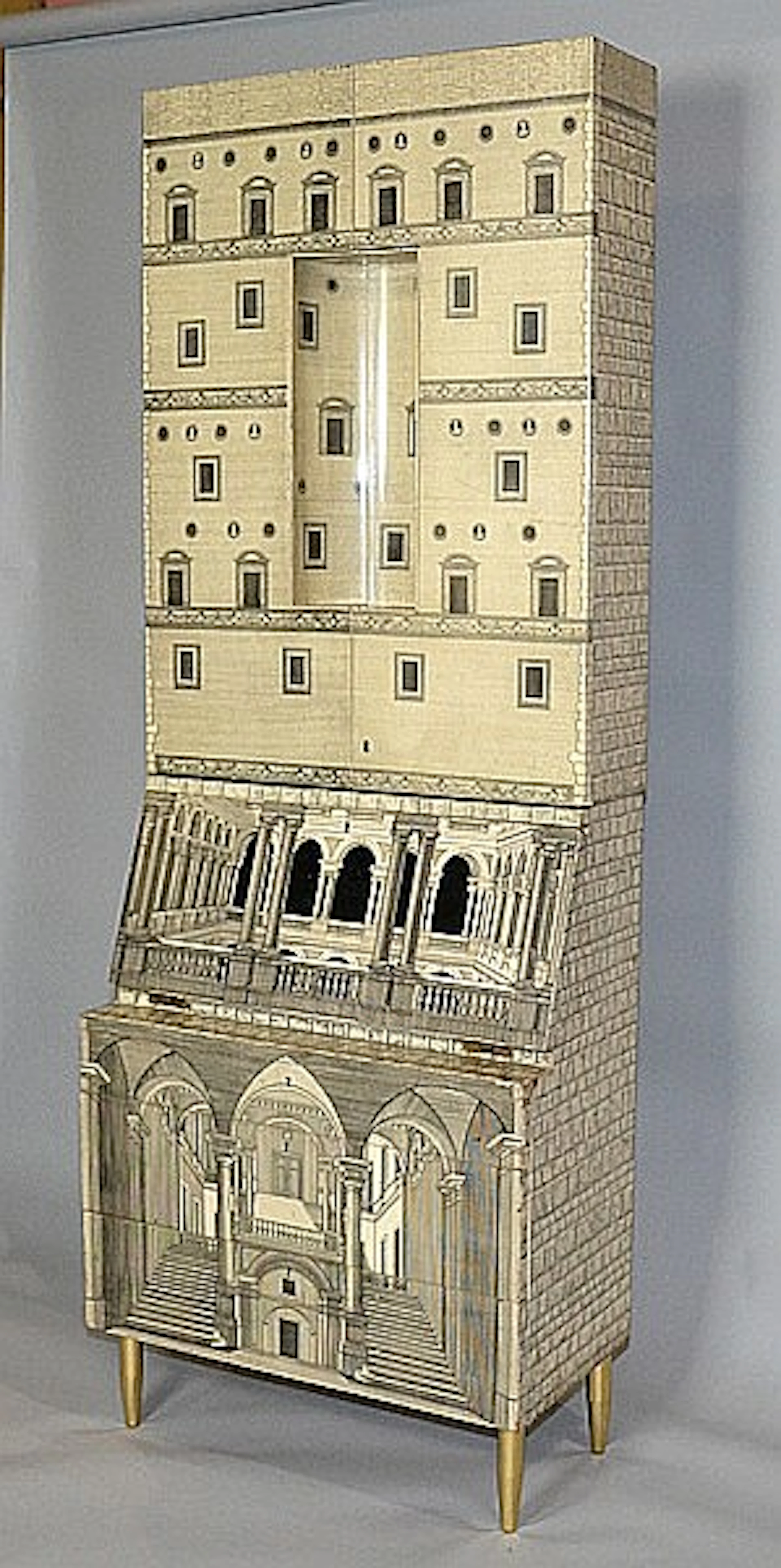 ''ARCHITETTURA'', A WOOD AND METAL TRUMEAU WITH LITHOGRAPHIC AND TRANSFER PRINTED DECORATION, DESIGNED BY PIERO FORNASETTI (1913-1988) & GIO PONTI (1891-1979). DESIGNED 1951, EXECUTED LATE 1950'S - Re