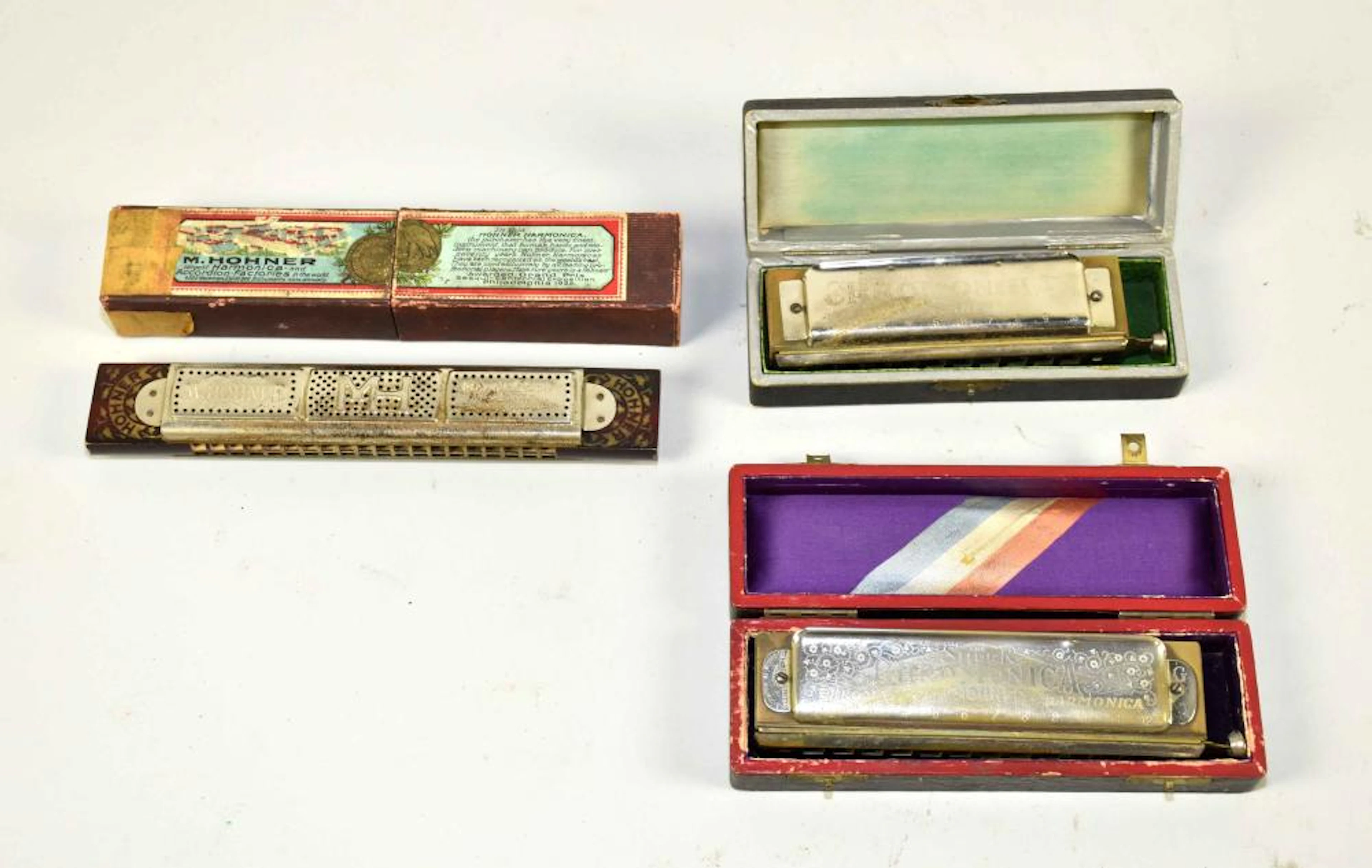 COLLECTION OF (3) ANTIQUE HARMONICAS. Largest: 8''L.