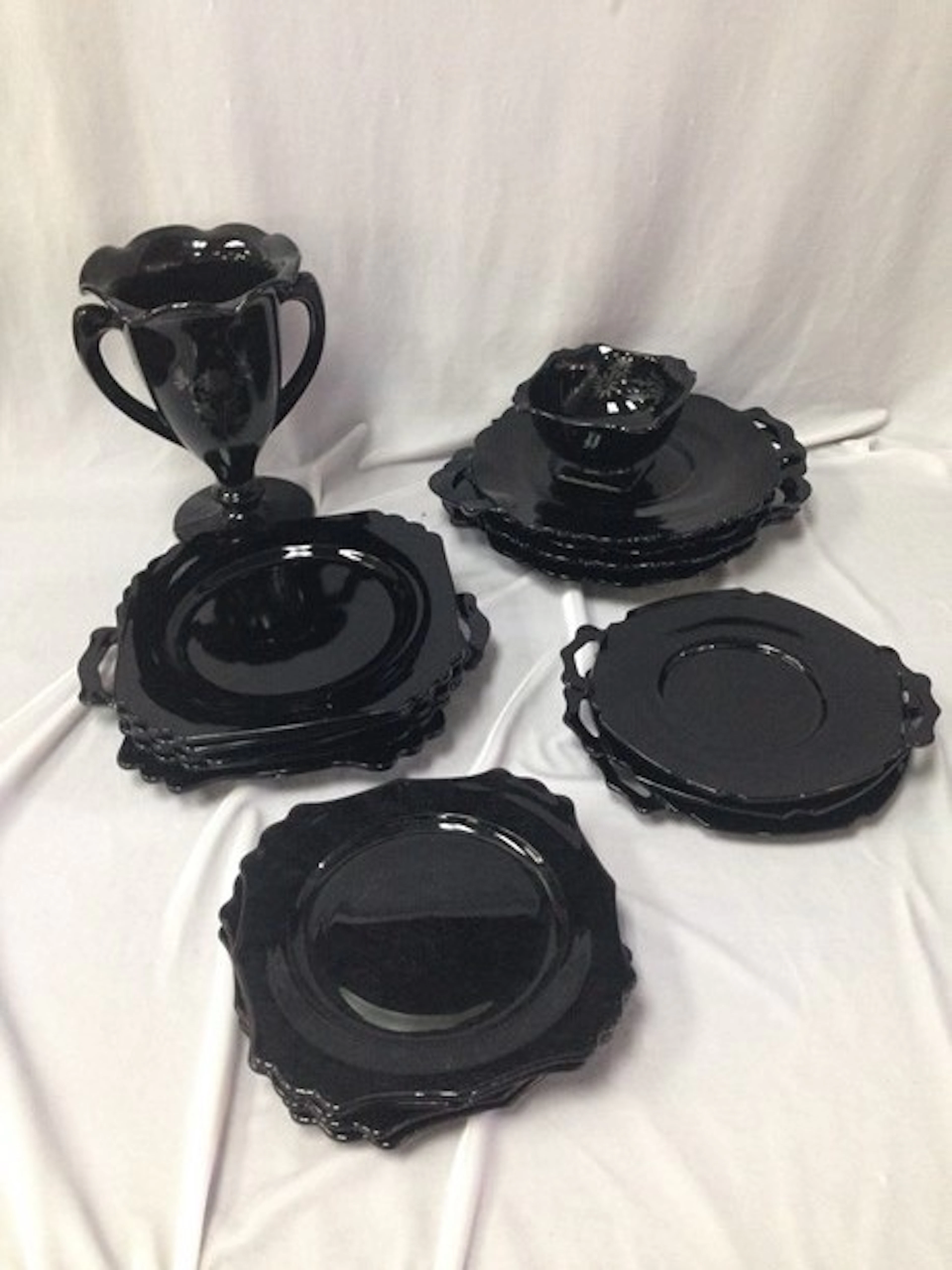 (18) Pieces Black Glass, Plates, Urn, Bowl.
