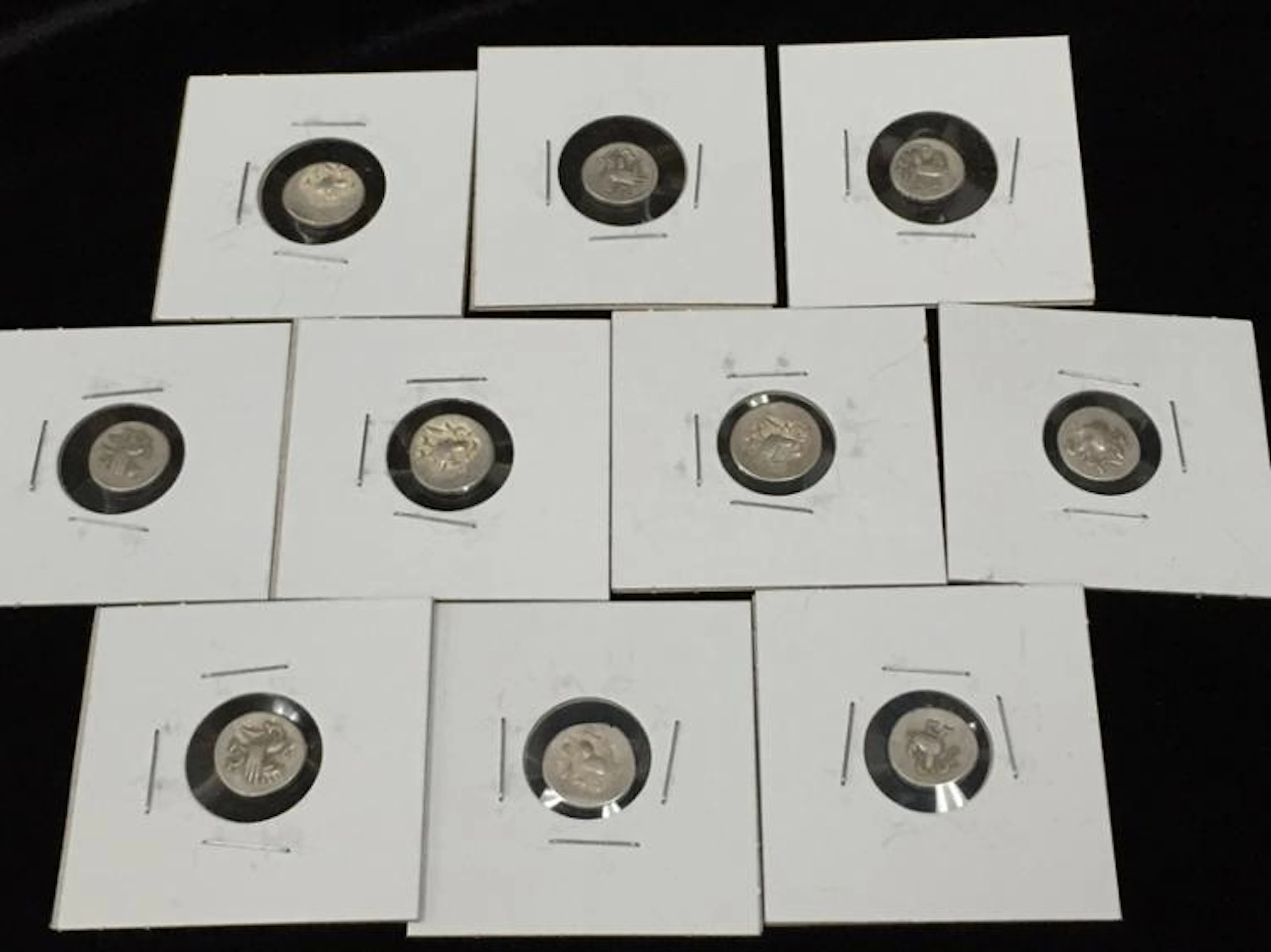 Lot of (10) Cambodian 2 PE Coins