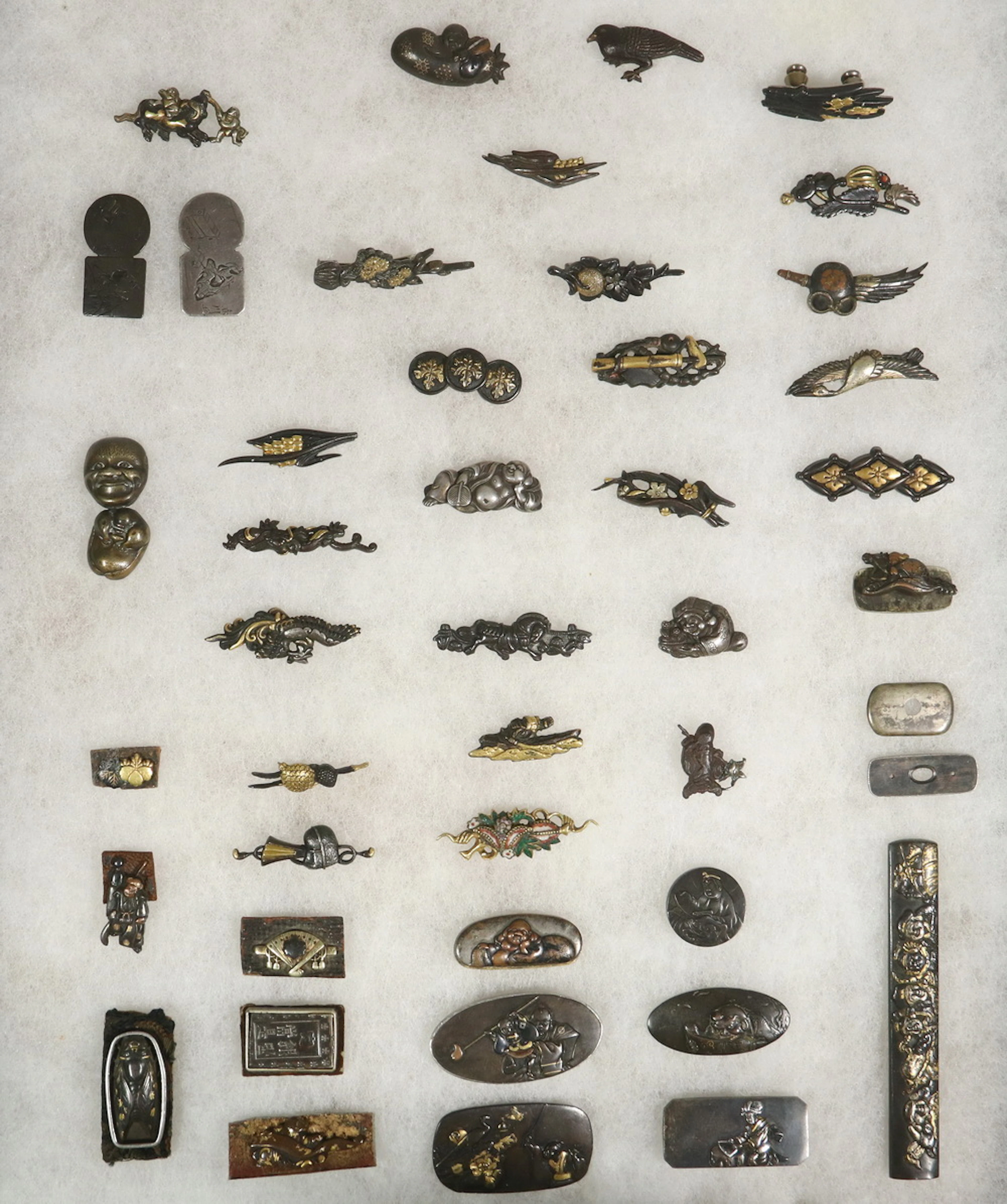 (40+) JAPANESE SWORD MENUKI & SAGEMONO (TOBACCO POUCH) FITTINGS