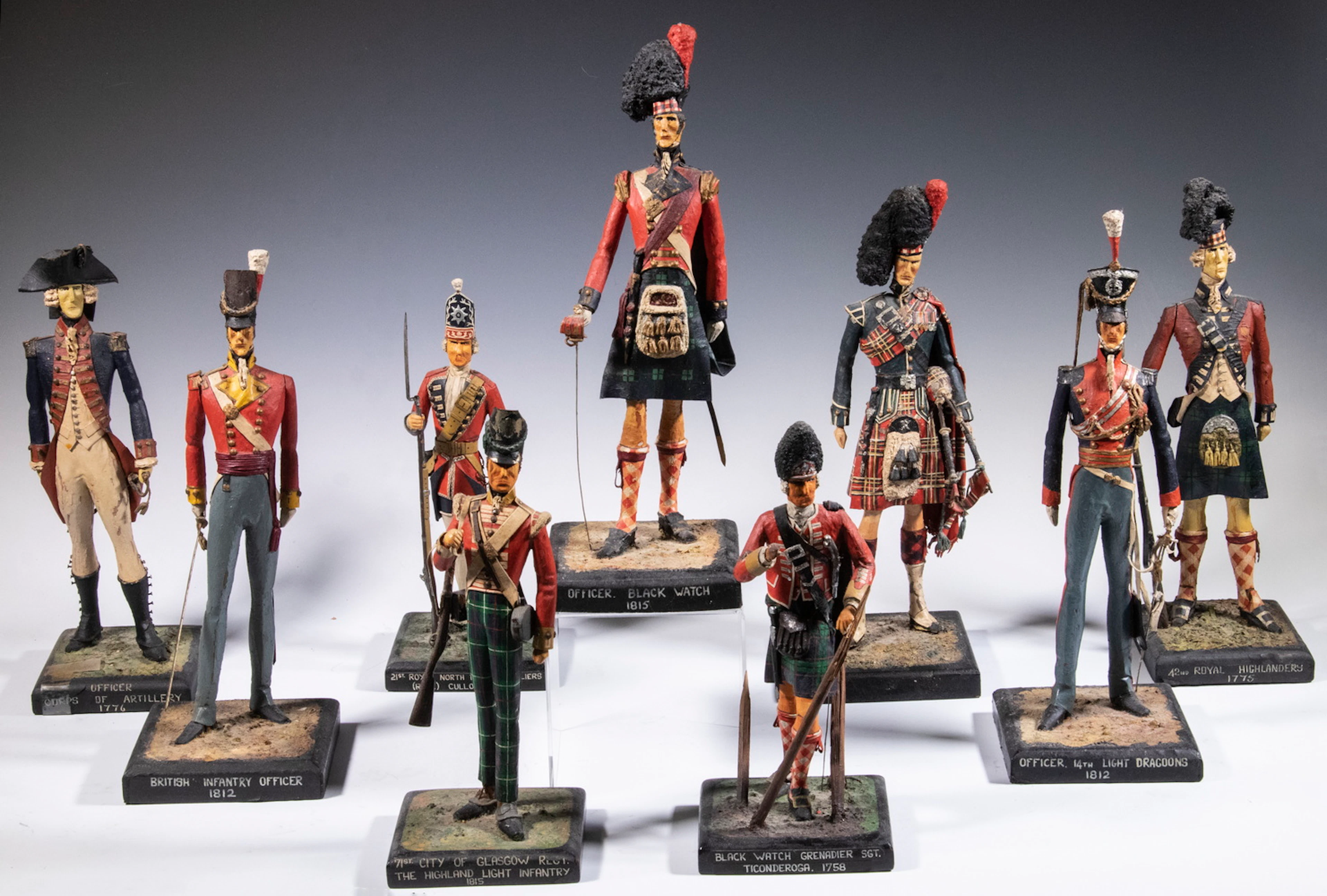 (9) BRITISH MILITARY FIGURES, SOME SIGNED I.H. ARTHUR