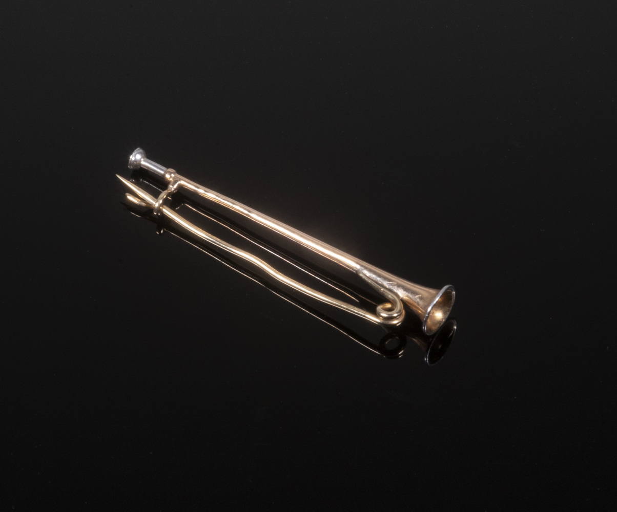 GOLD TRUMPET BROOCH