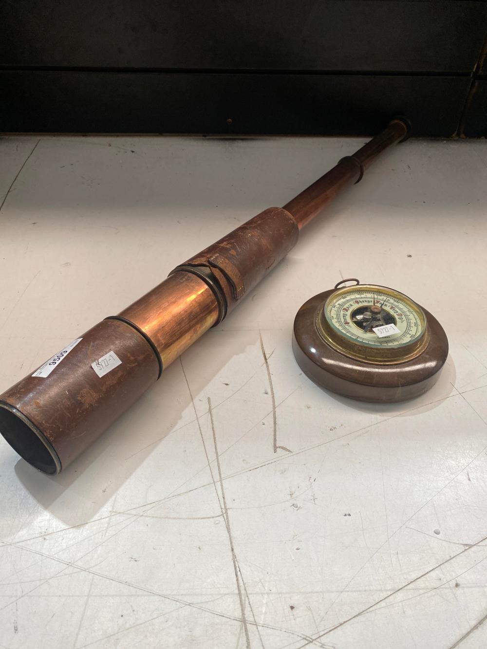 Military brass telescope with brown leather covering