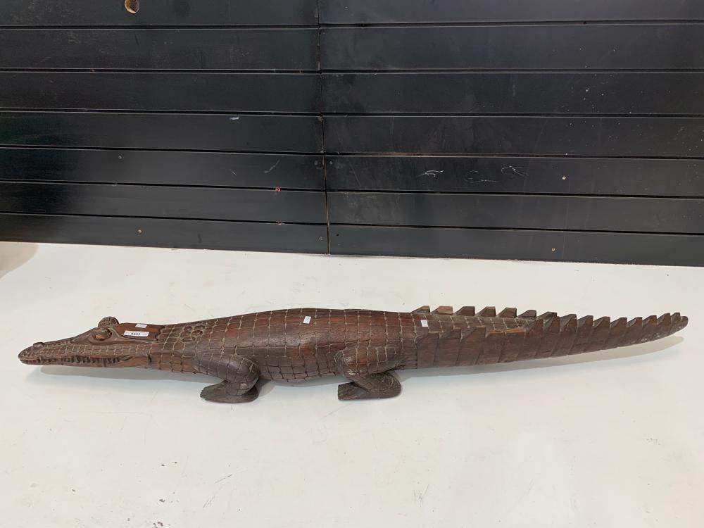 Large hand carved alligator in hardwood. 136cm L, 18cm W, 15cm H.