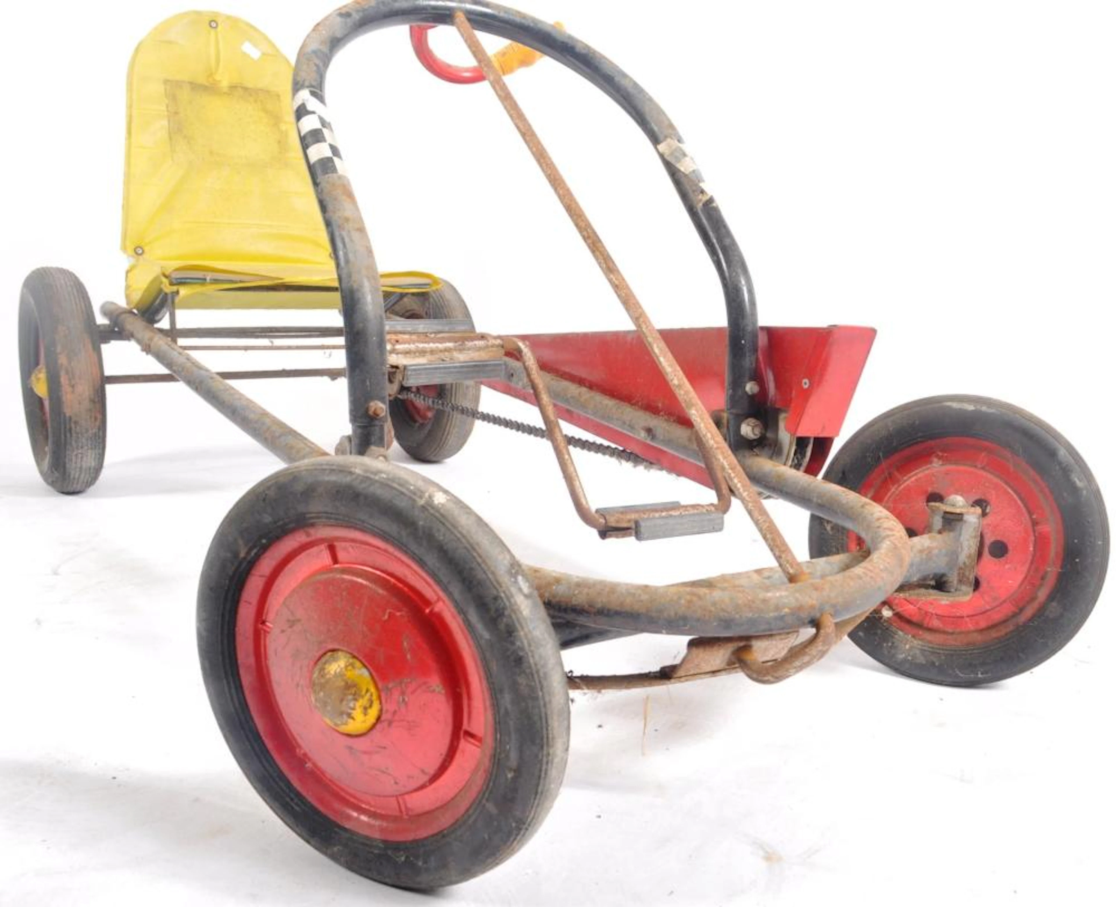 Dragster - A vintage pedal car / go cart of typical form...