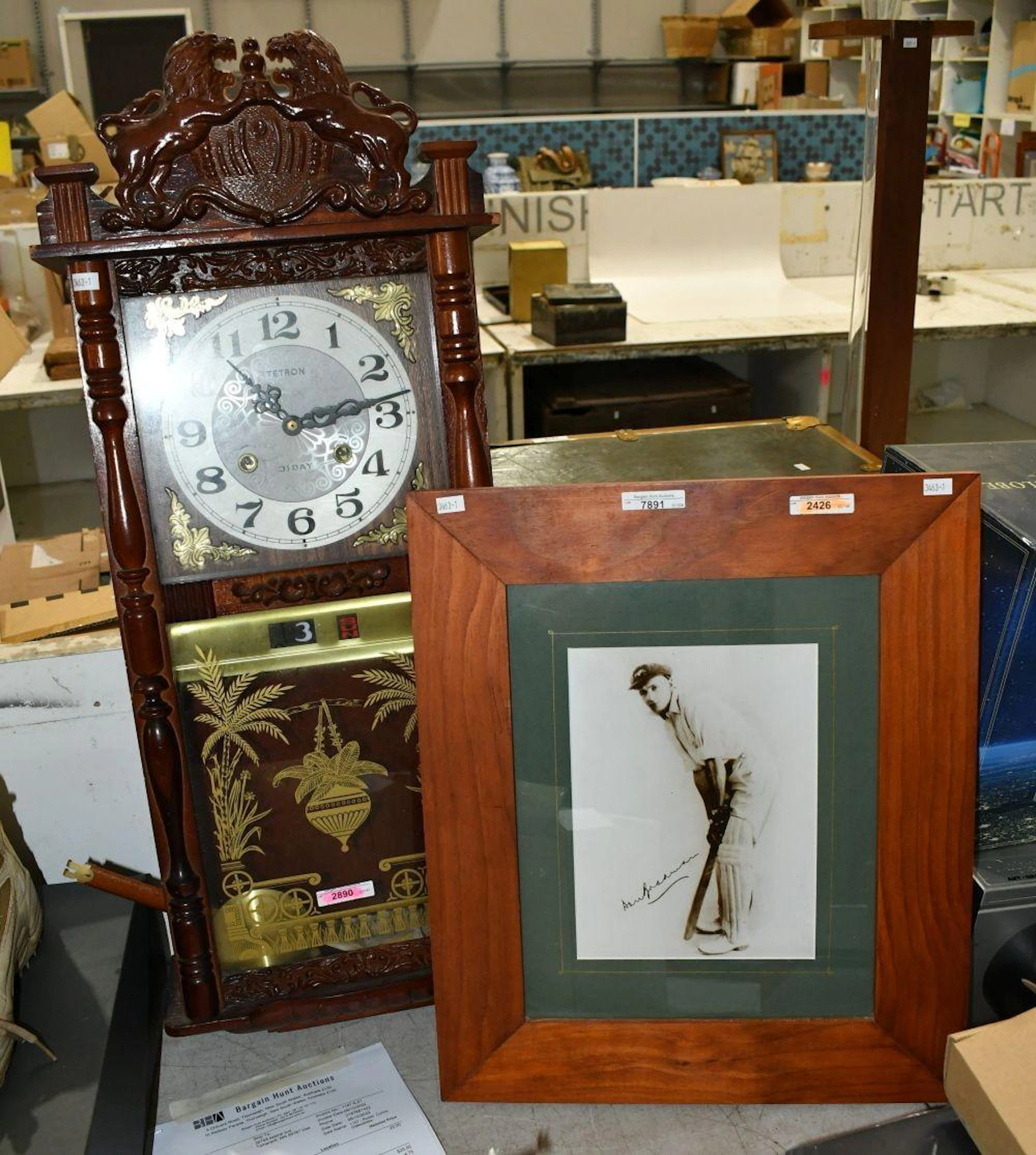 2 Items - including a framed Don Bradman photo print with...