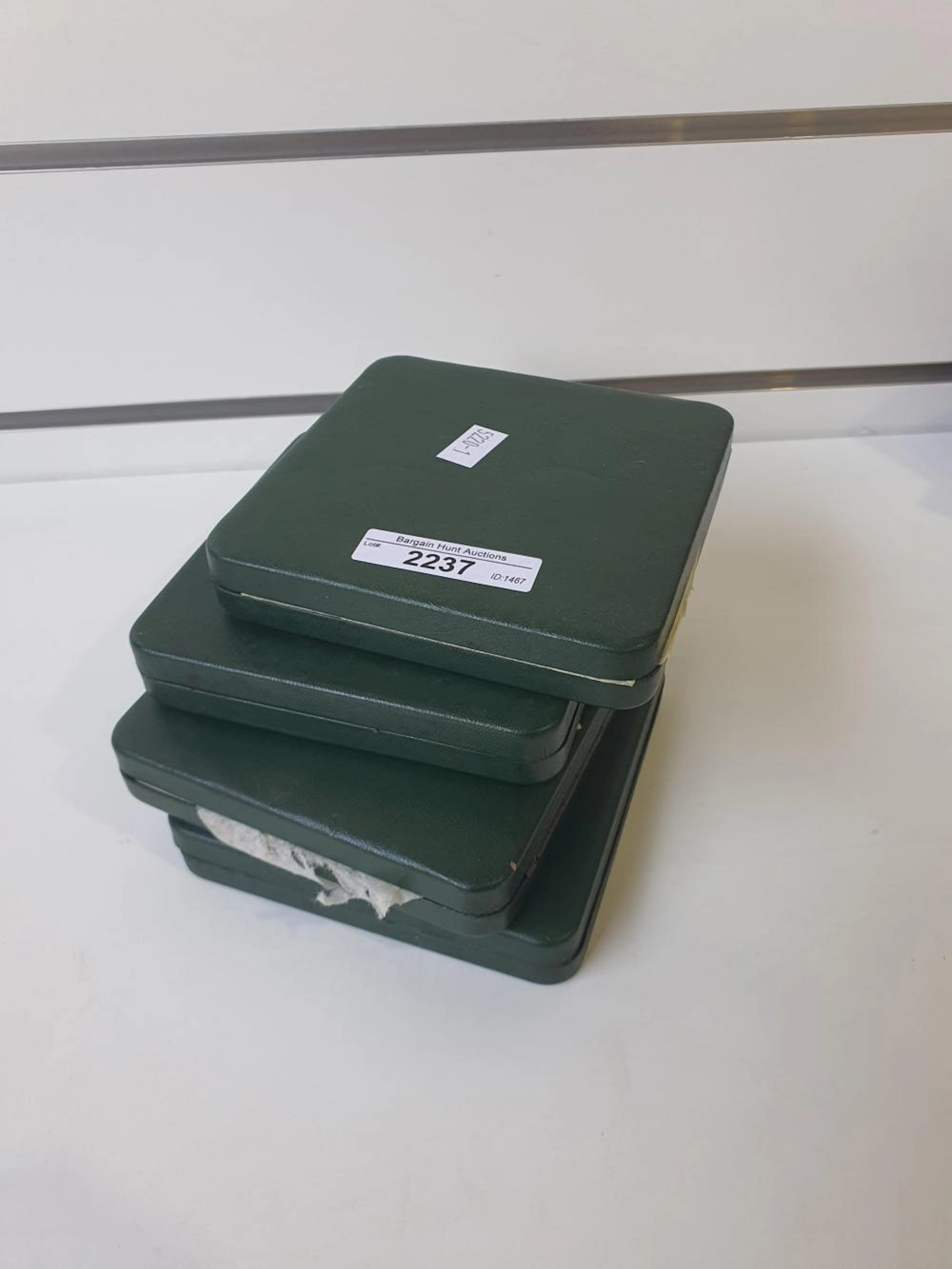 4 x World Proof Coin Sets incl, Guernsey and Ghana. 11cm x 11cm.
