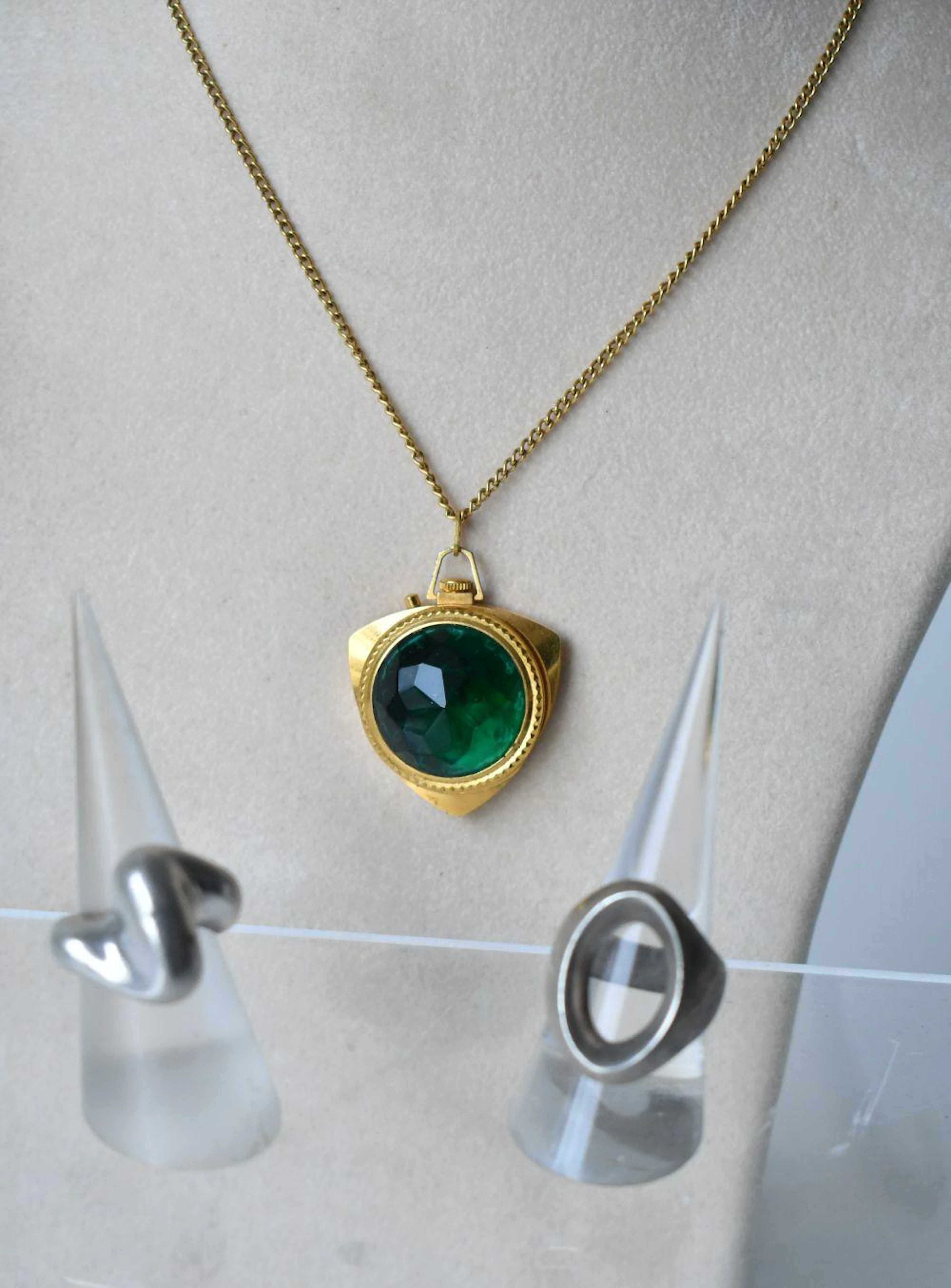 3 pieces of vintage jewellery including two silver rings and one pendant watch