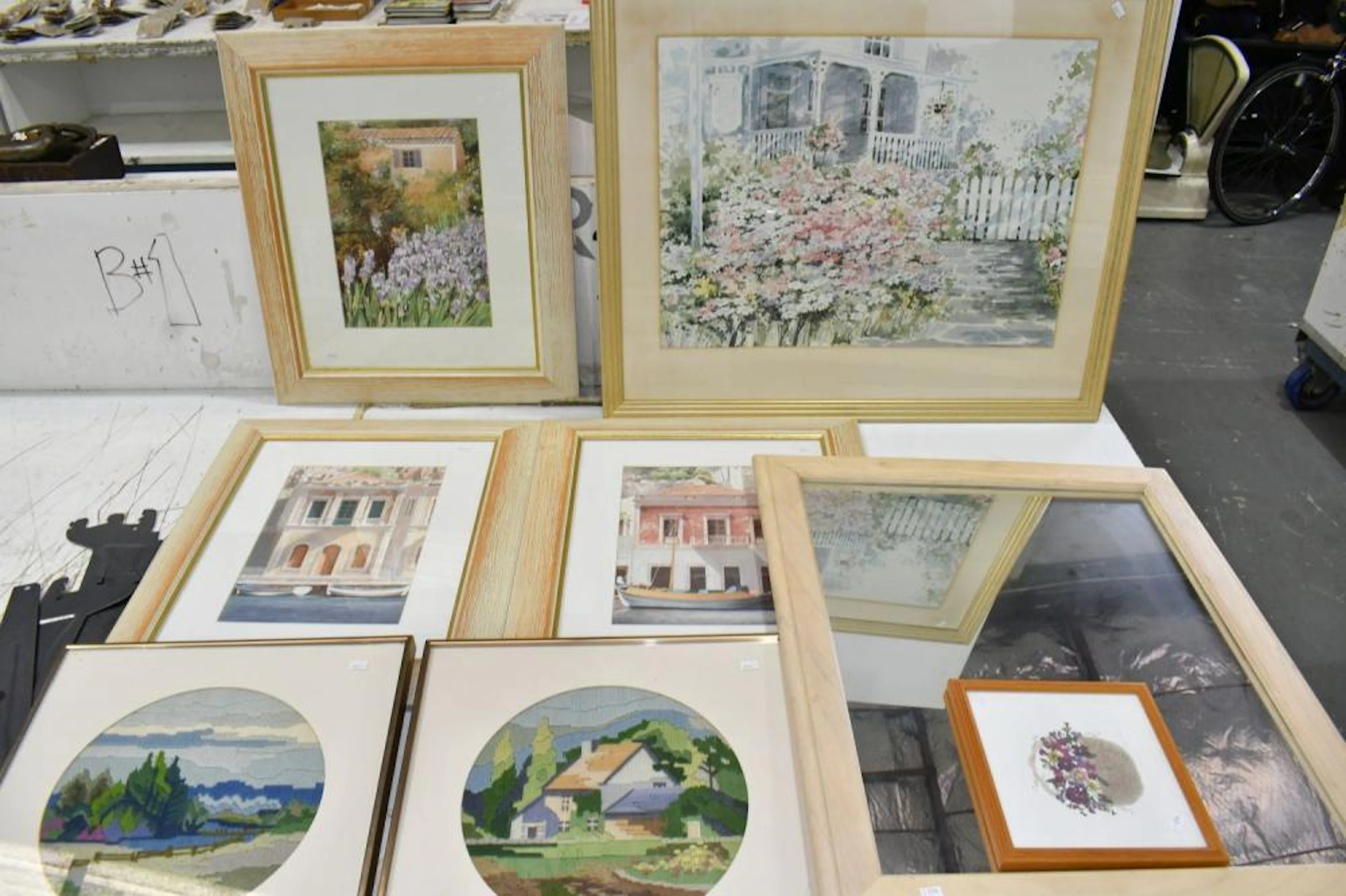 Seven Framed Artworks and a Wall Mirror - four house