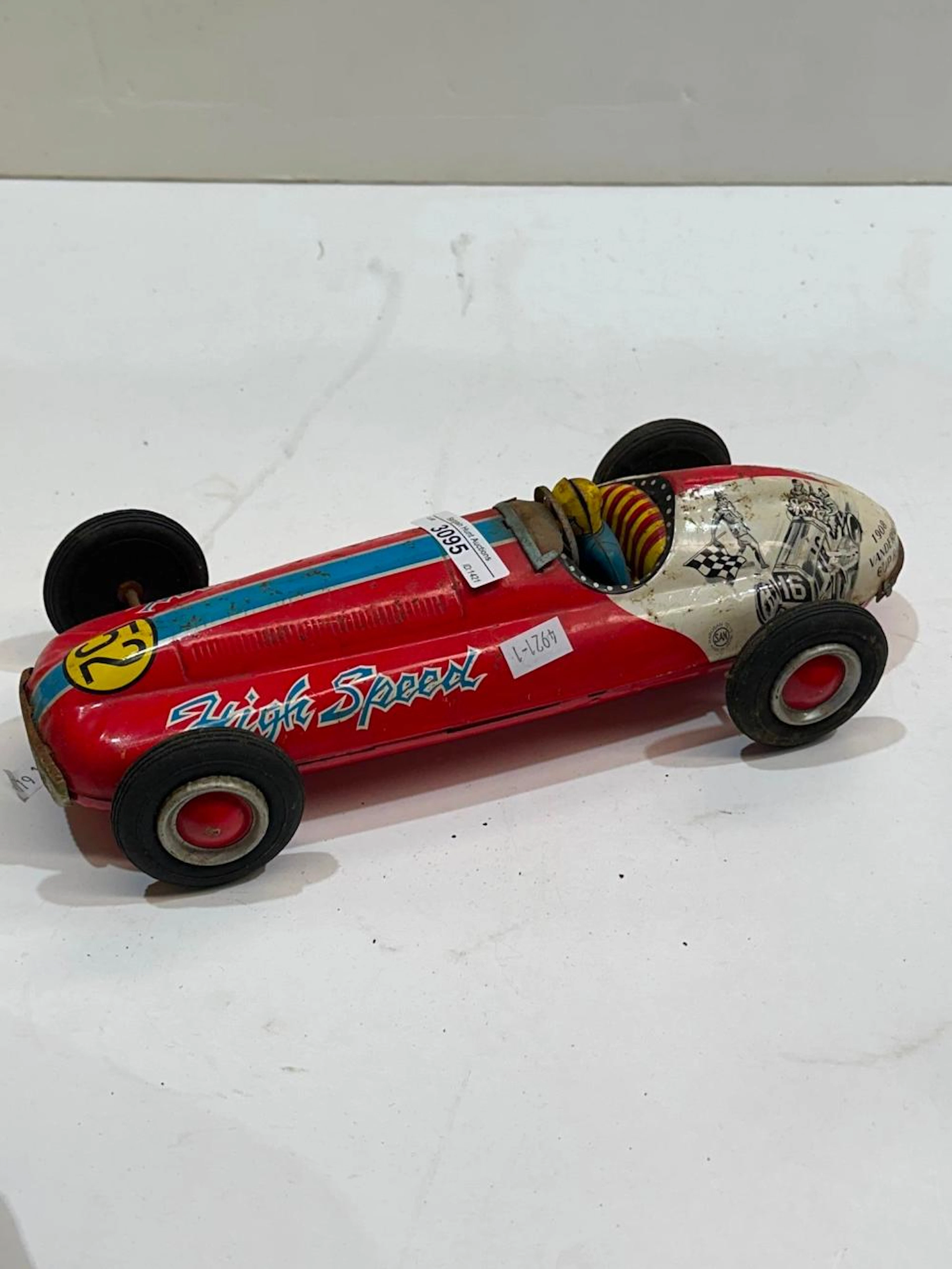 Vintage Japanese tin plate racing car made by Marusan toys
