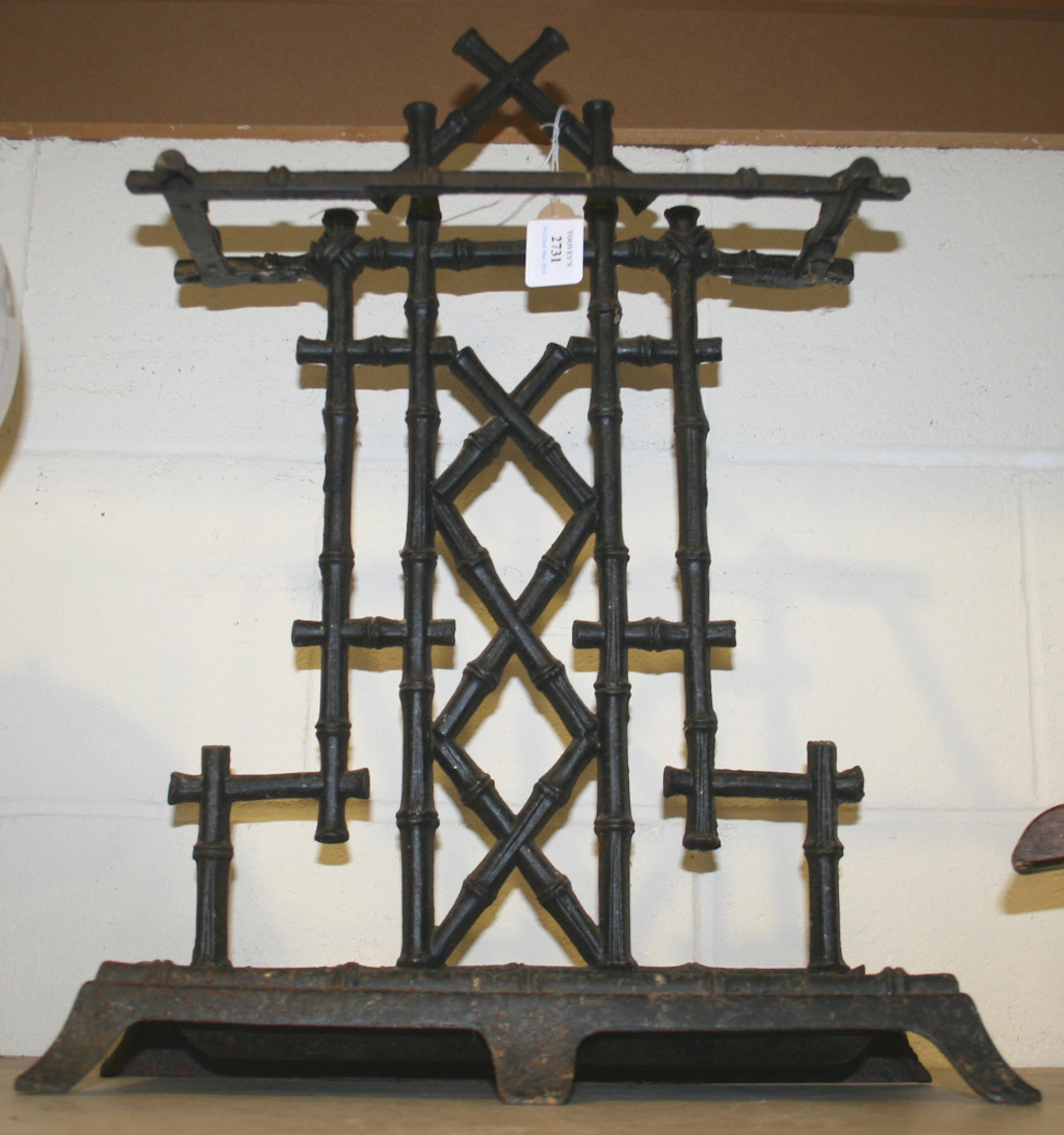 AN EARLY 20TH CENTURY FRENCH CAST IRON STICK STAND OF OVERALL FAUX BAMBOO FORM