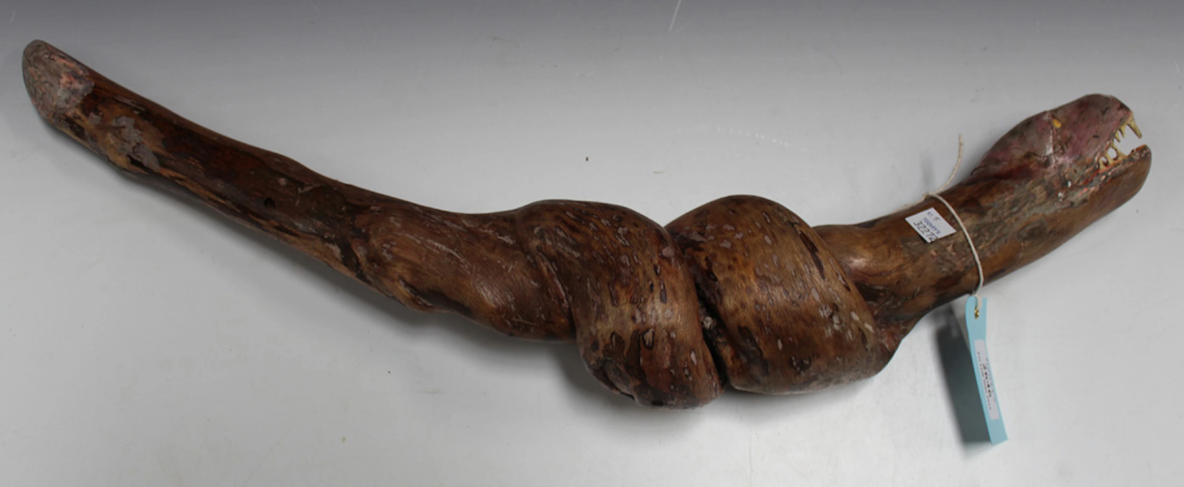 AN EARLY 20TH CENTURY FOLK ART TWISTED BRANCH