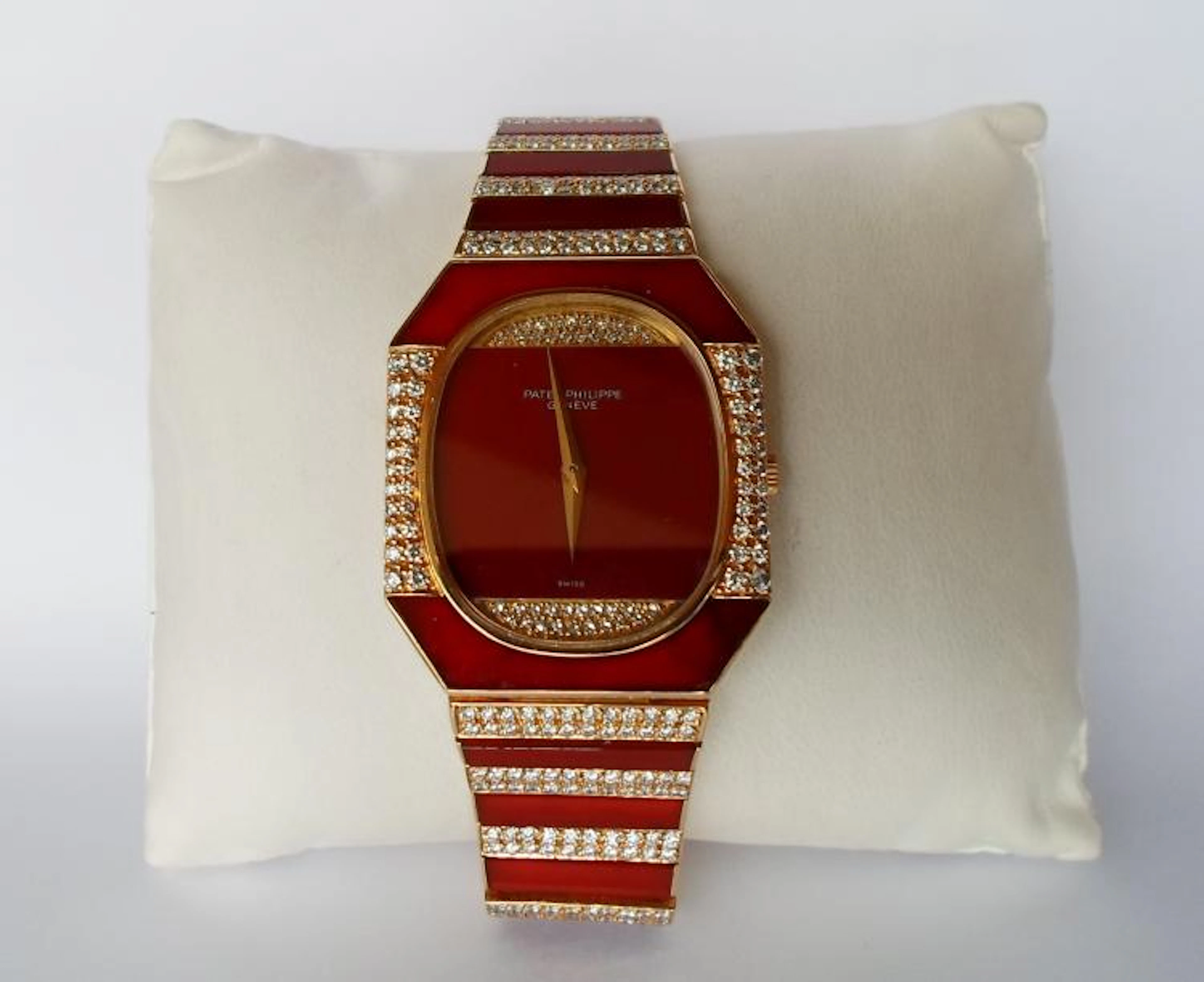 An Yellow Patek Philippe Encrusted with Rubies and Diamonds.