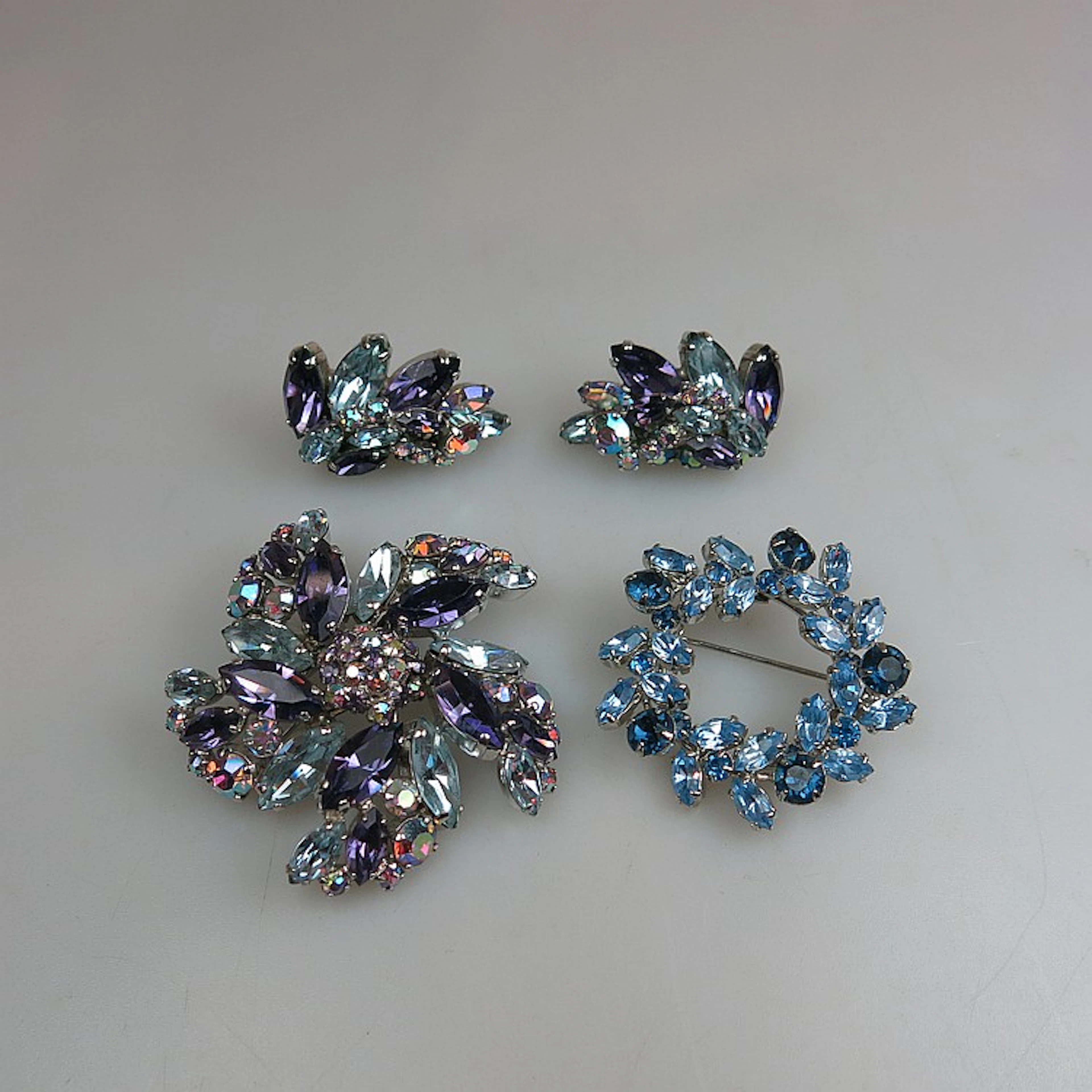 Two Sherman Silver Tone Metal Brooches And A Pair Of Matching Earrings