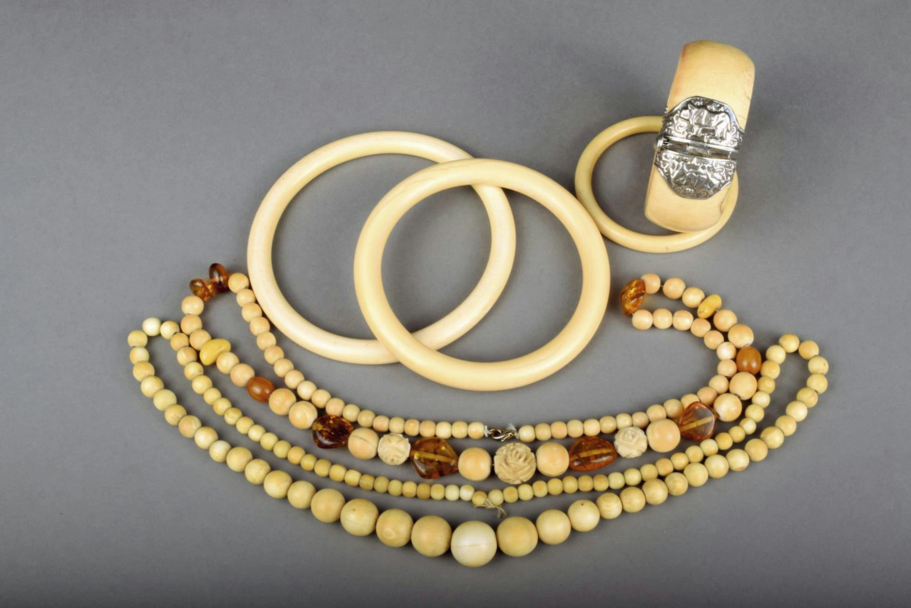 ‡ Three African ivory bracelets