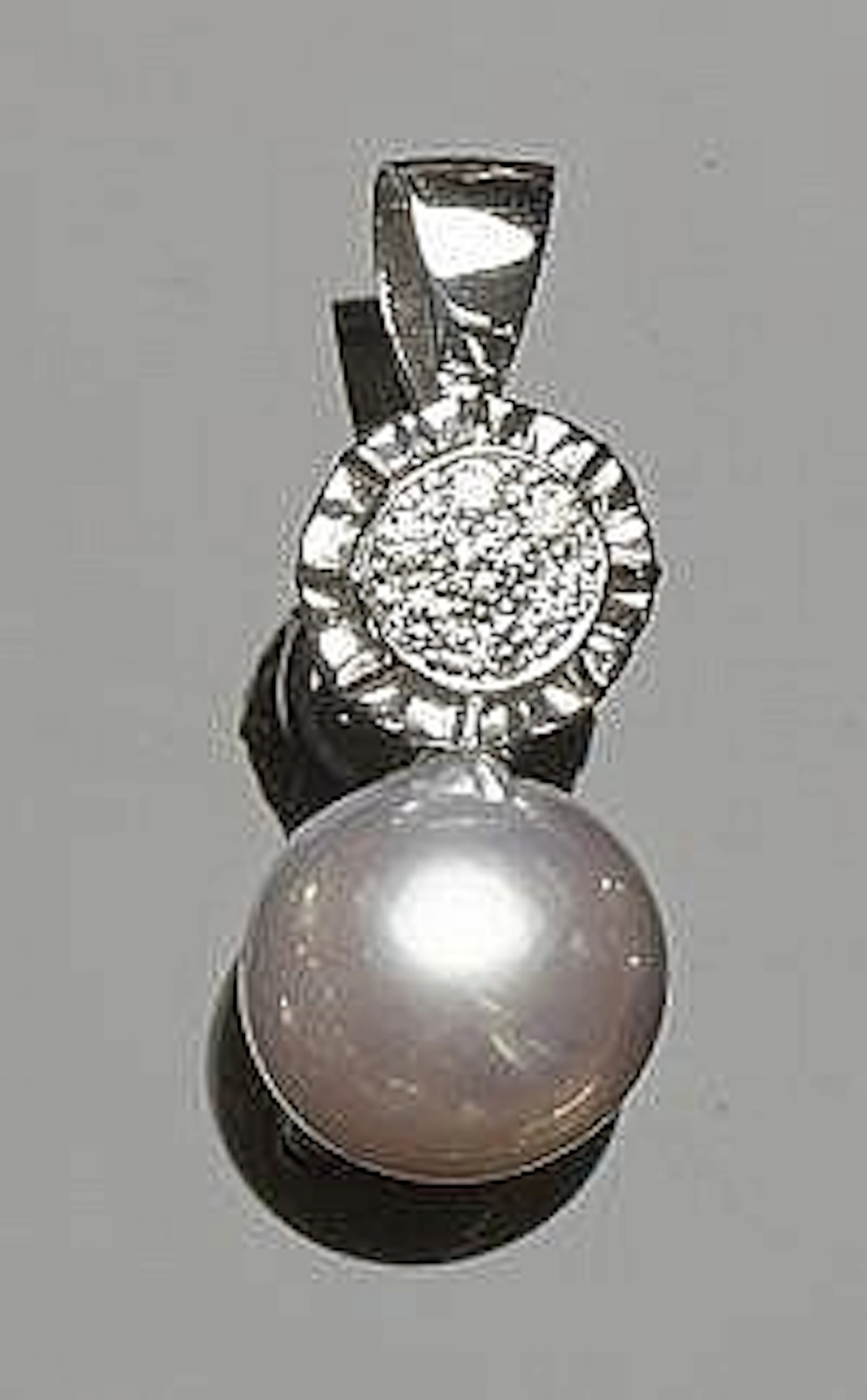A GOLD, PEARL AND DIAMOND RING