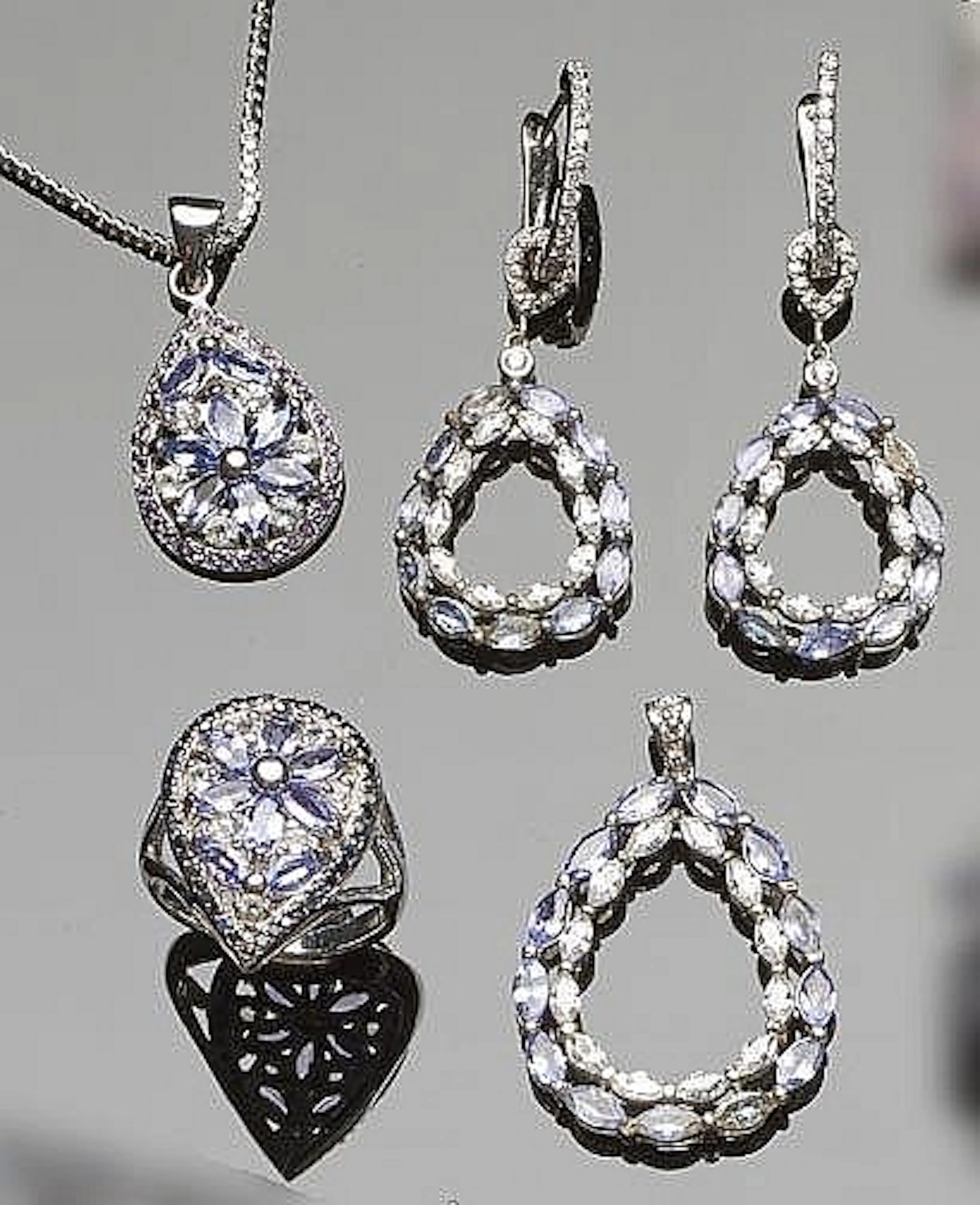 A SET OF STERLING SILVER, TANZANITE AND ZIRCON JEWELRY