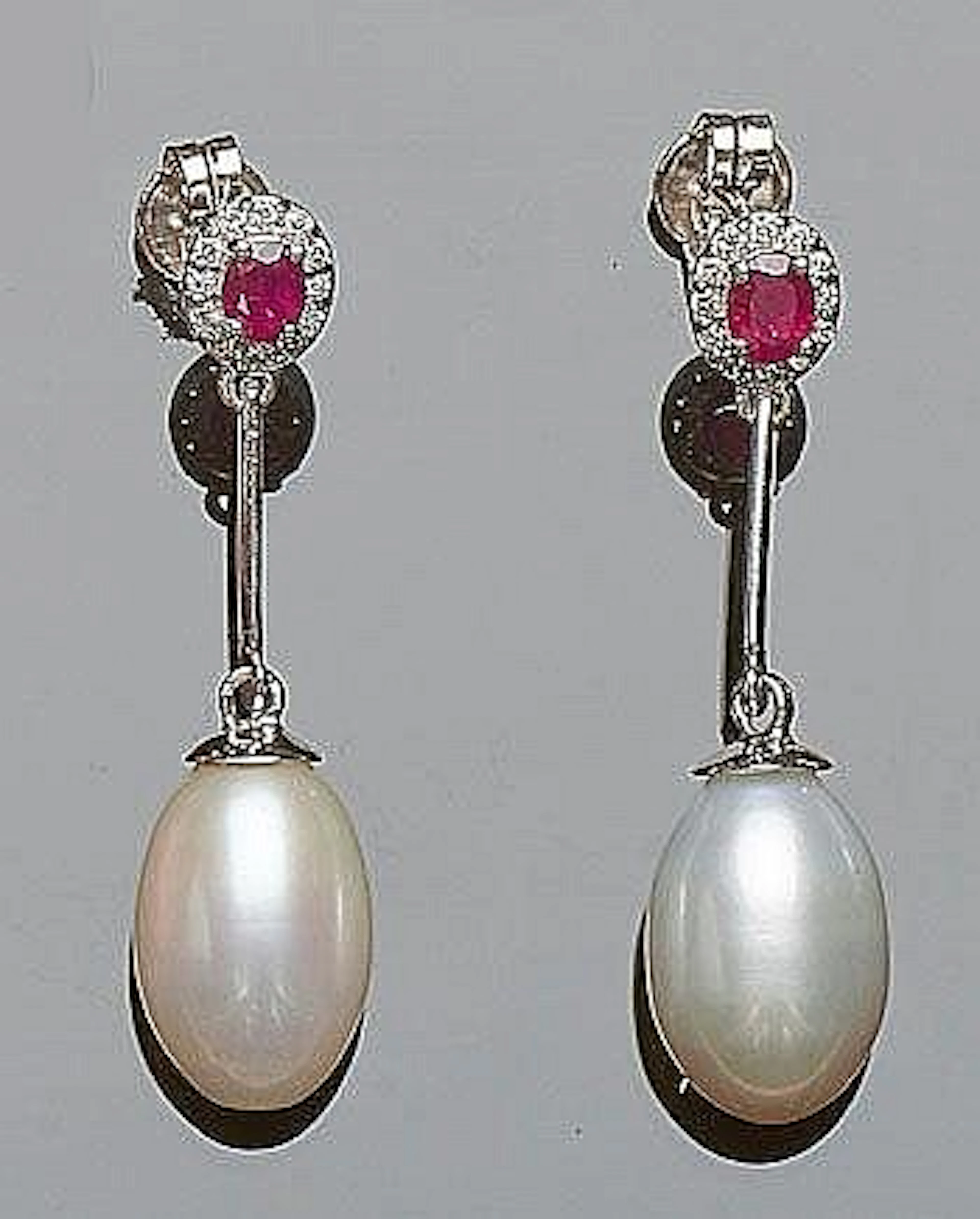Pendientes largos en oro blanco