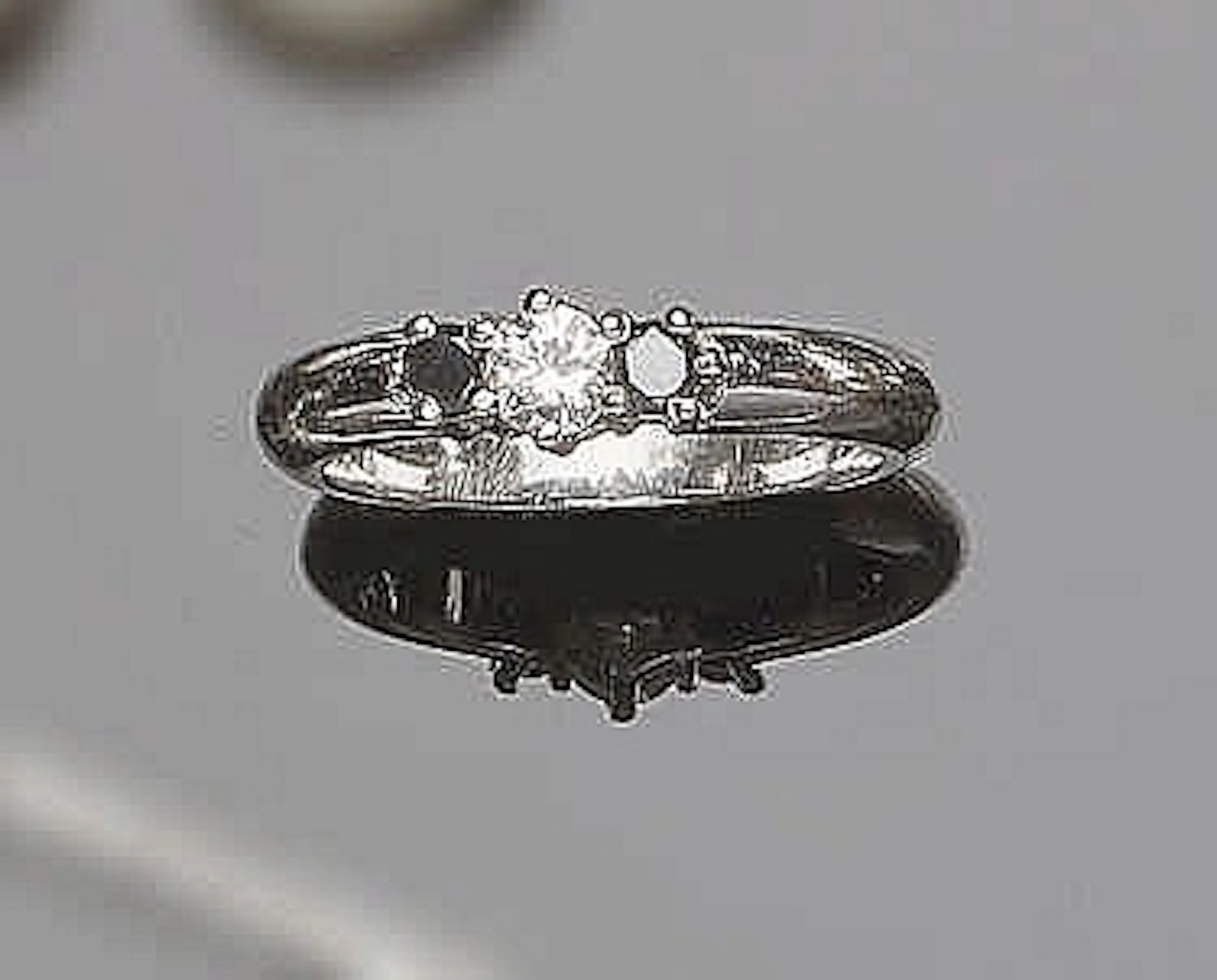 A GOLD, SAPPHIRE AND DIAMOND RING