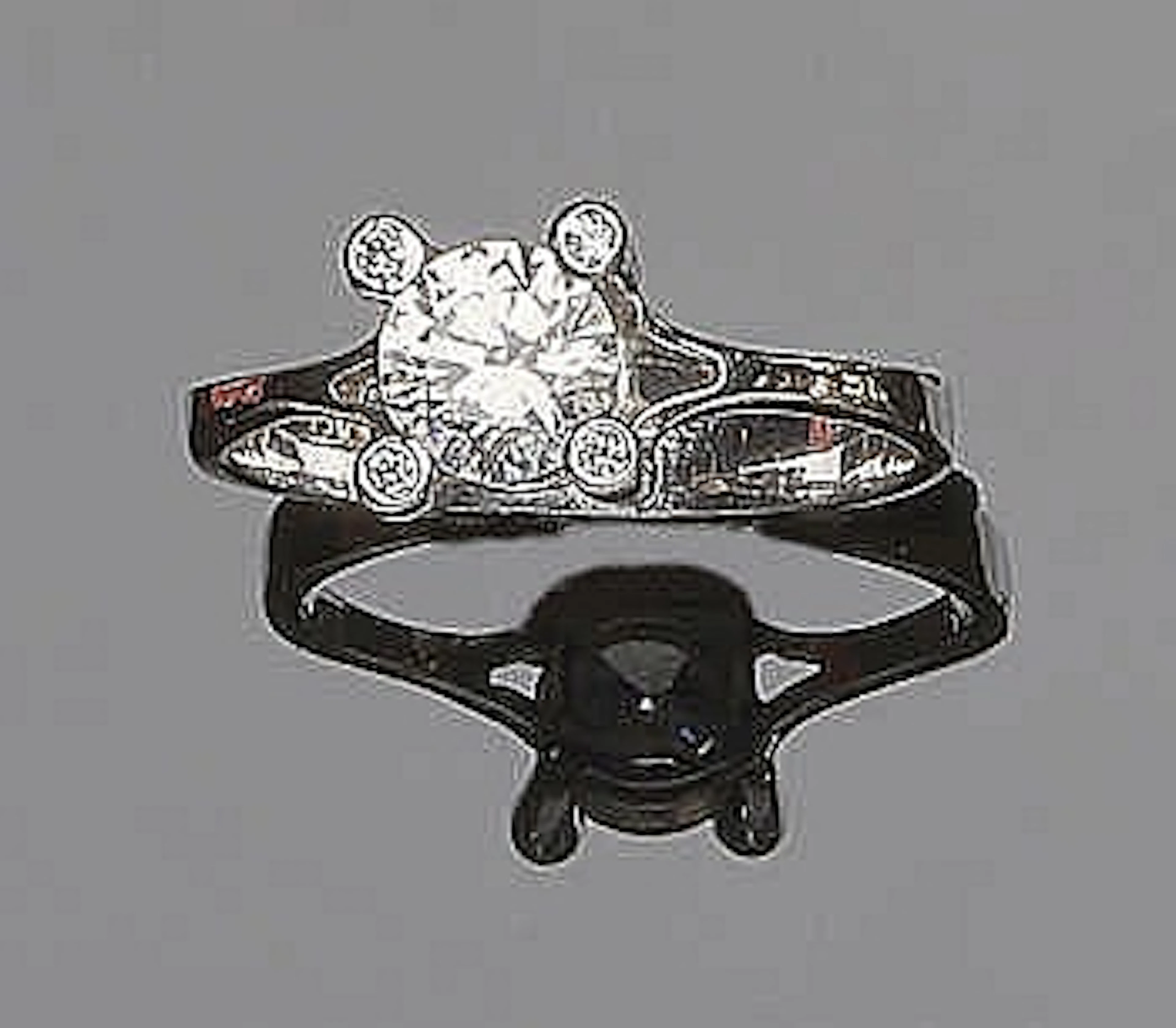 A GOLD AND ZIRCON RING