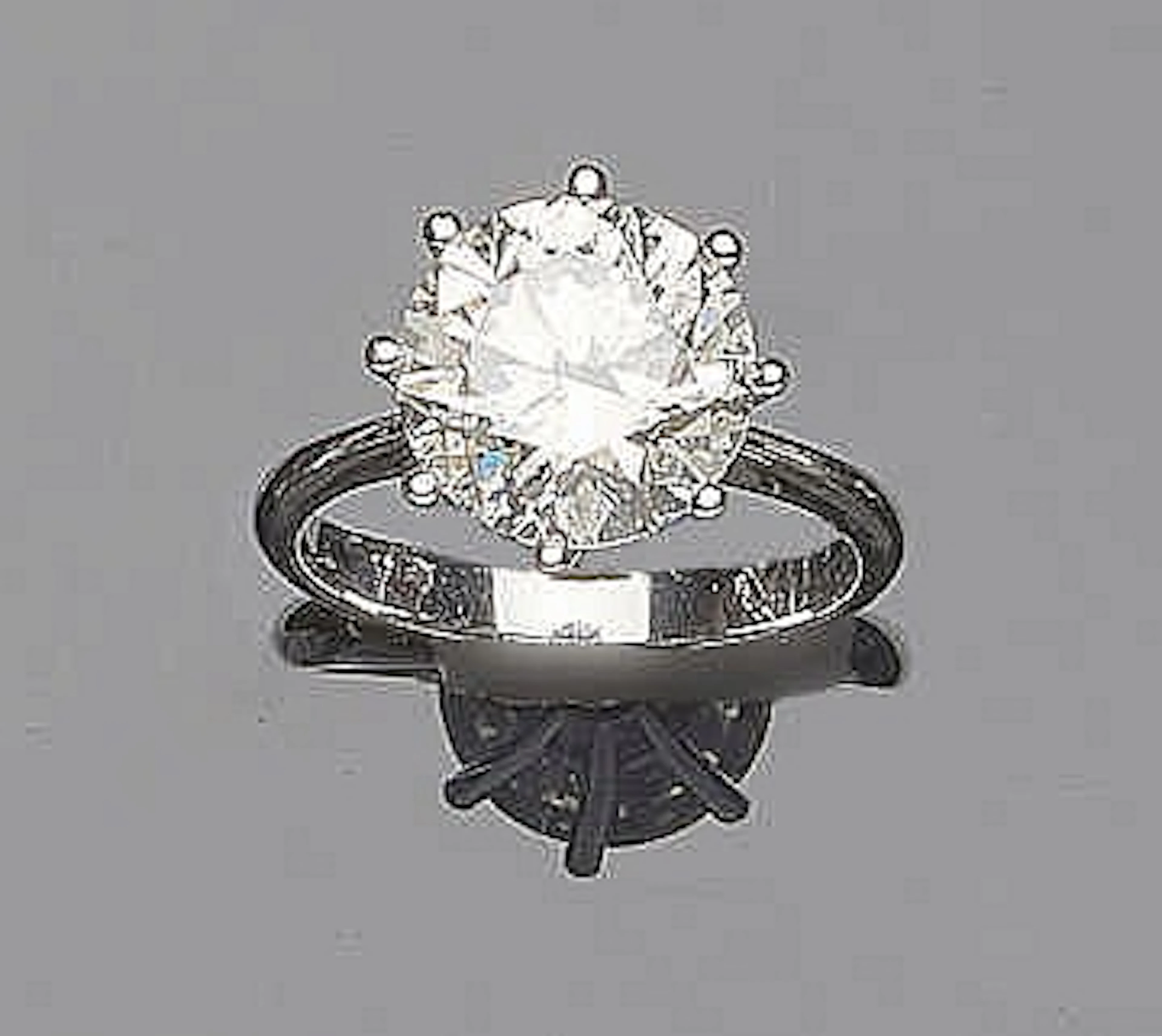 A GOLD AND DIAMOND RING